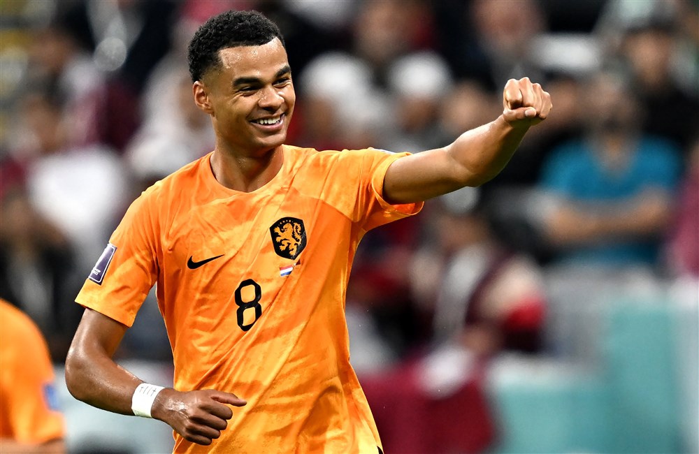 epa10336560 Cody Gakpo of the Netherlands celebrates after scoring the 1-0 goal during the FIFA World Cup 2022 group A soccer match between the Netherlands and Qatar at Al Bayt Stadium in Al Khor, Qatar, 29 November 2022.  EPA-EFE/Noushad Thekkayil