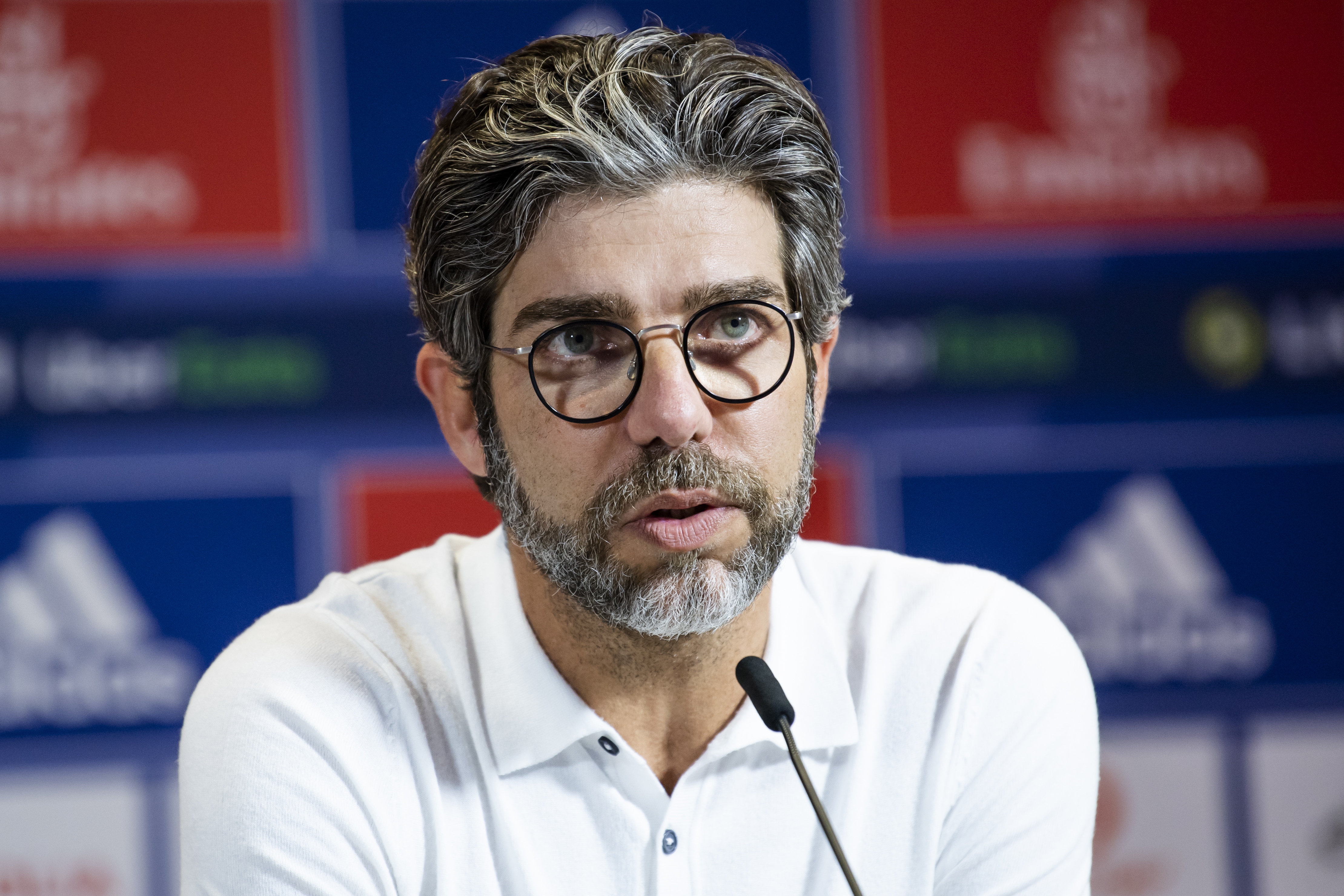 epa09429324 Juninho, sport director of Olympique Lyonnais, speaks during a press conference of Olympique Lyonnais at the OL Training Center, in Decines-Charpieu near Lyon, France, 25 August 2021.  EPA-EFE/JEAN-CHRISTOPHE BOTT