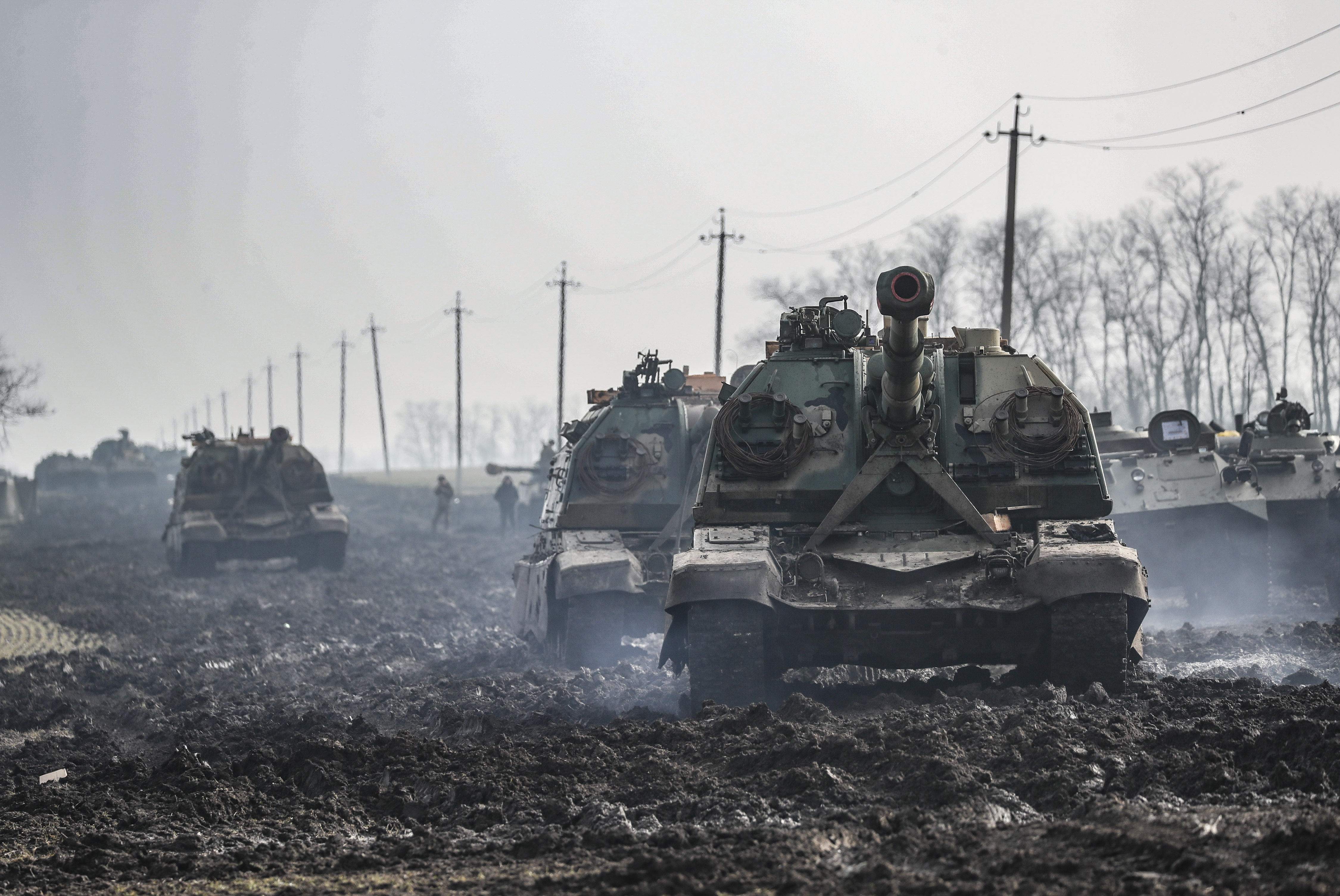 Russian armoured vehicles stand on the road in Rostov region