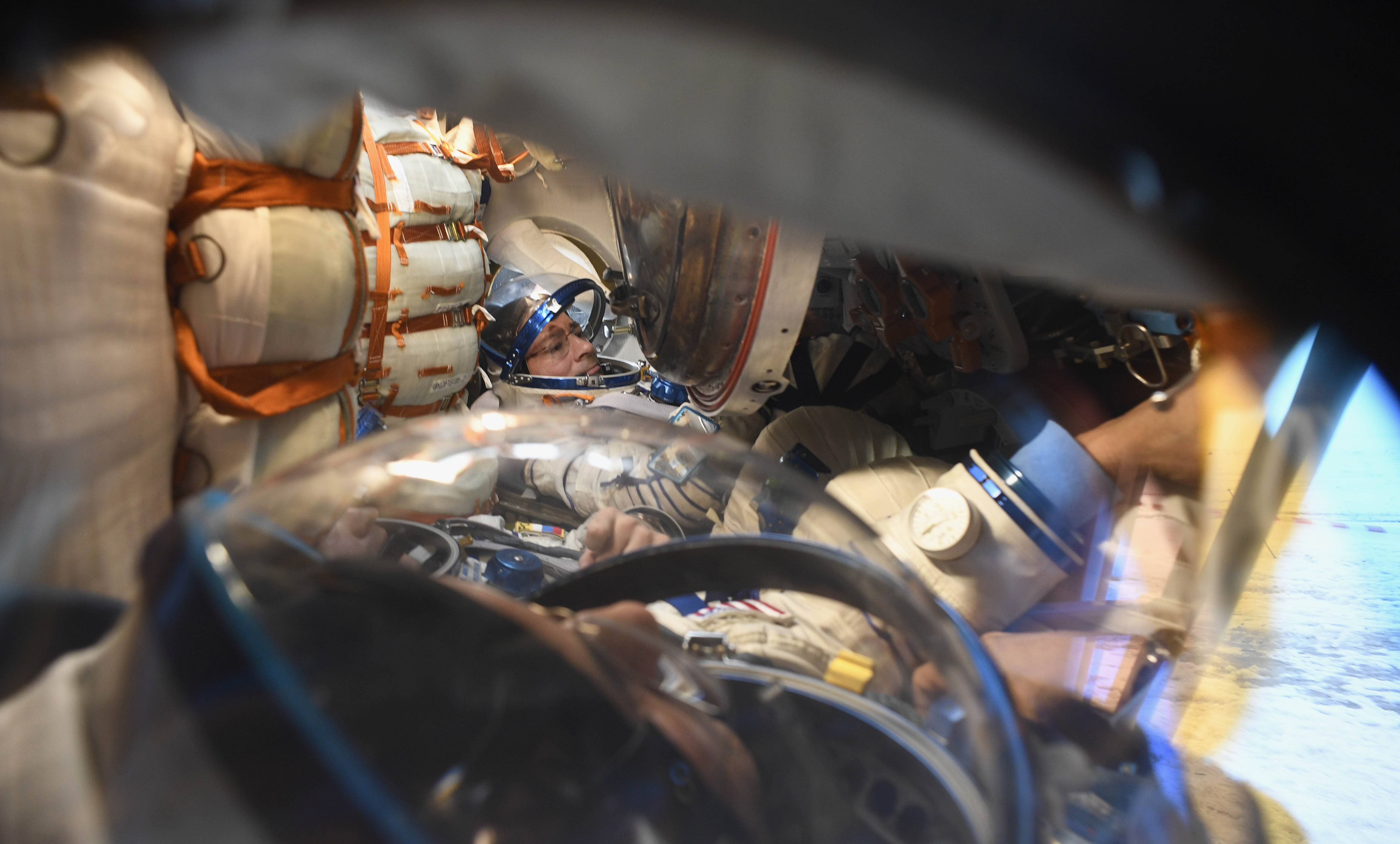 Soyuz MS-06  space capsule carrying the ISS crew returns to earth