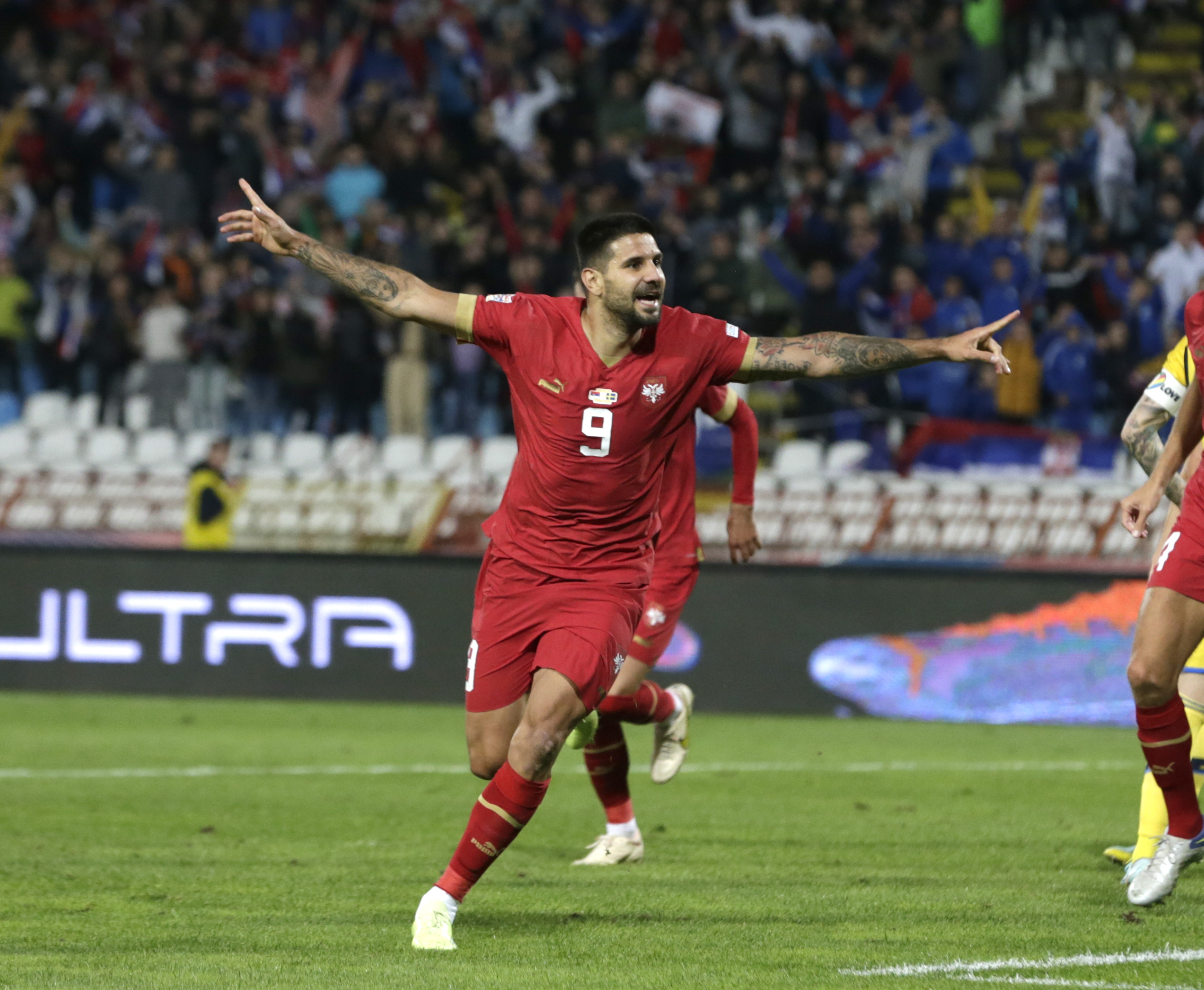 epa10204307 Serbia's Aleksandar Mitrovic celebrates after scoring the 2-1 lead during the UEFA Nations League soccer match between Serbia and Sweden in Belgrade, Serbia, 24 September 2022.  EPA-EFE/ANDREJ CUKIC
