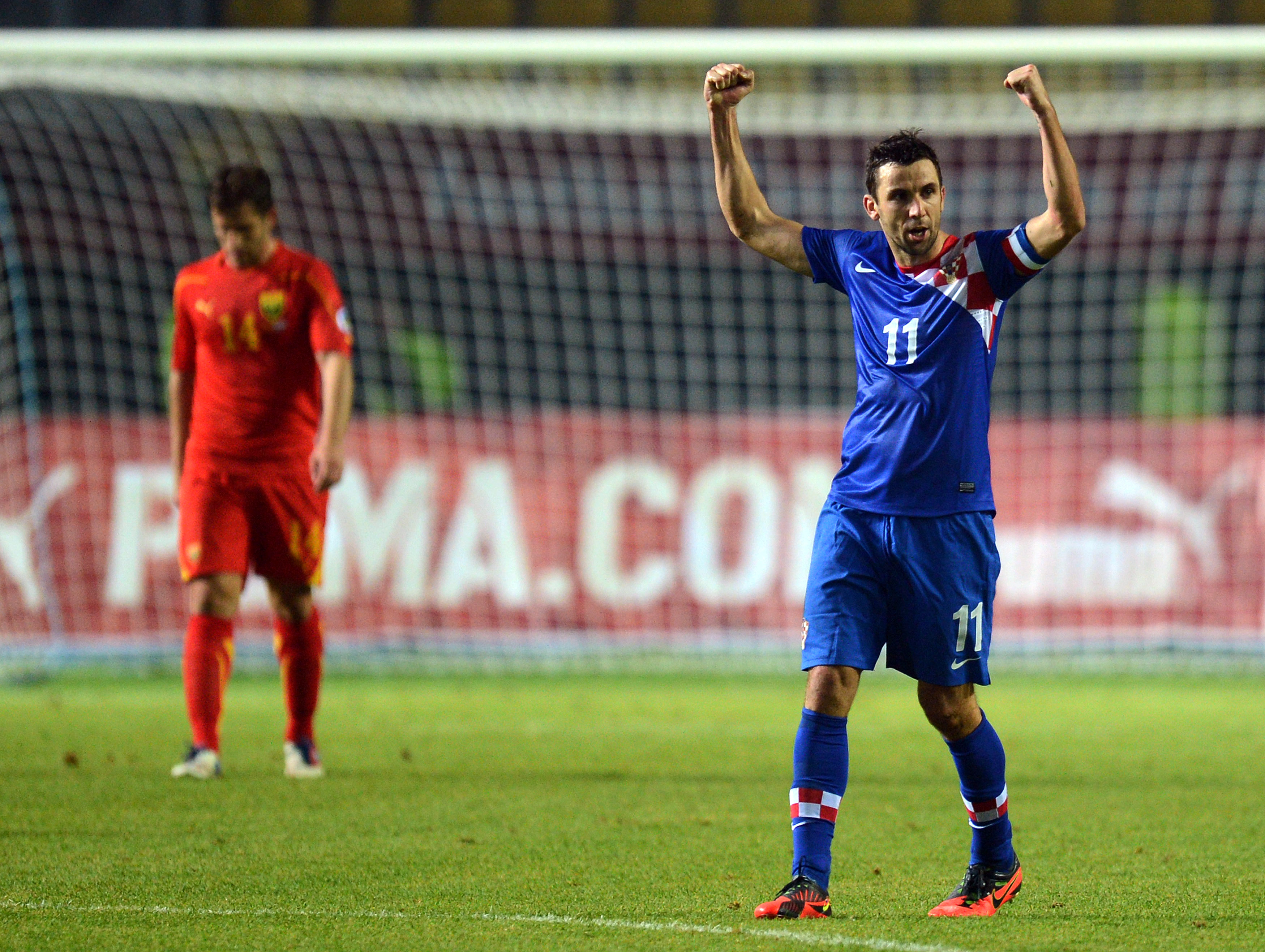 epa03430925 Croatian player Dario Srna reacts after  the FIFA World Cup 2014 qualifying soccer match between Macedonia and Croatia at the Filip II arena in Skopje, The Former Yugoslav Republic of Macedonia, 12 October 2012.  EPA/GEORGI LICOVSKI