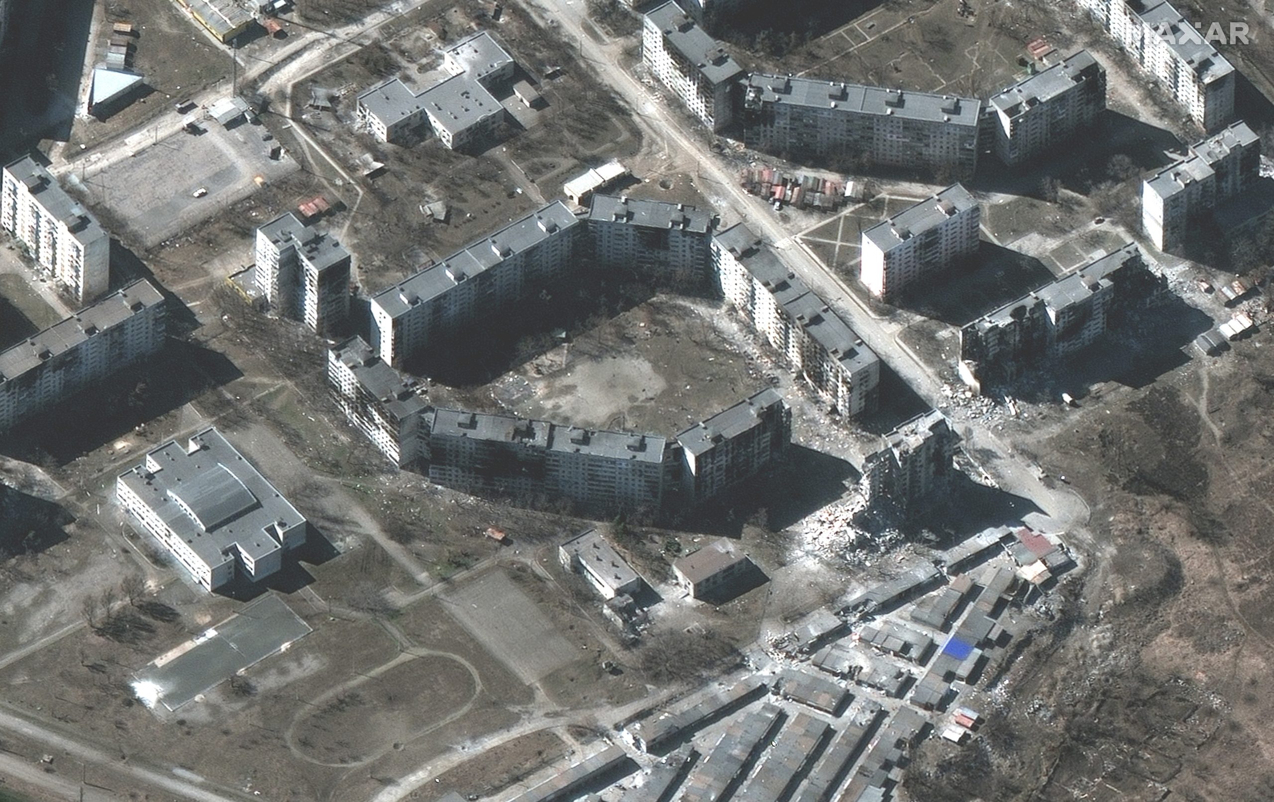 This satellite image provided by Maxar Technologies shows destroyed apartment buildings in Mariupol, Ukraine Tuesday, March 22, 2022. (Satellite image ©2022 Maxar Technologies via AP)