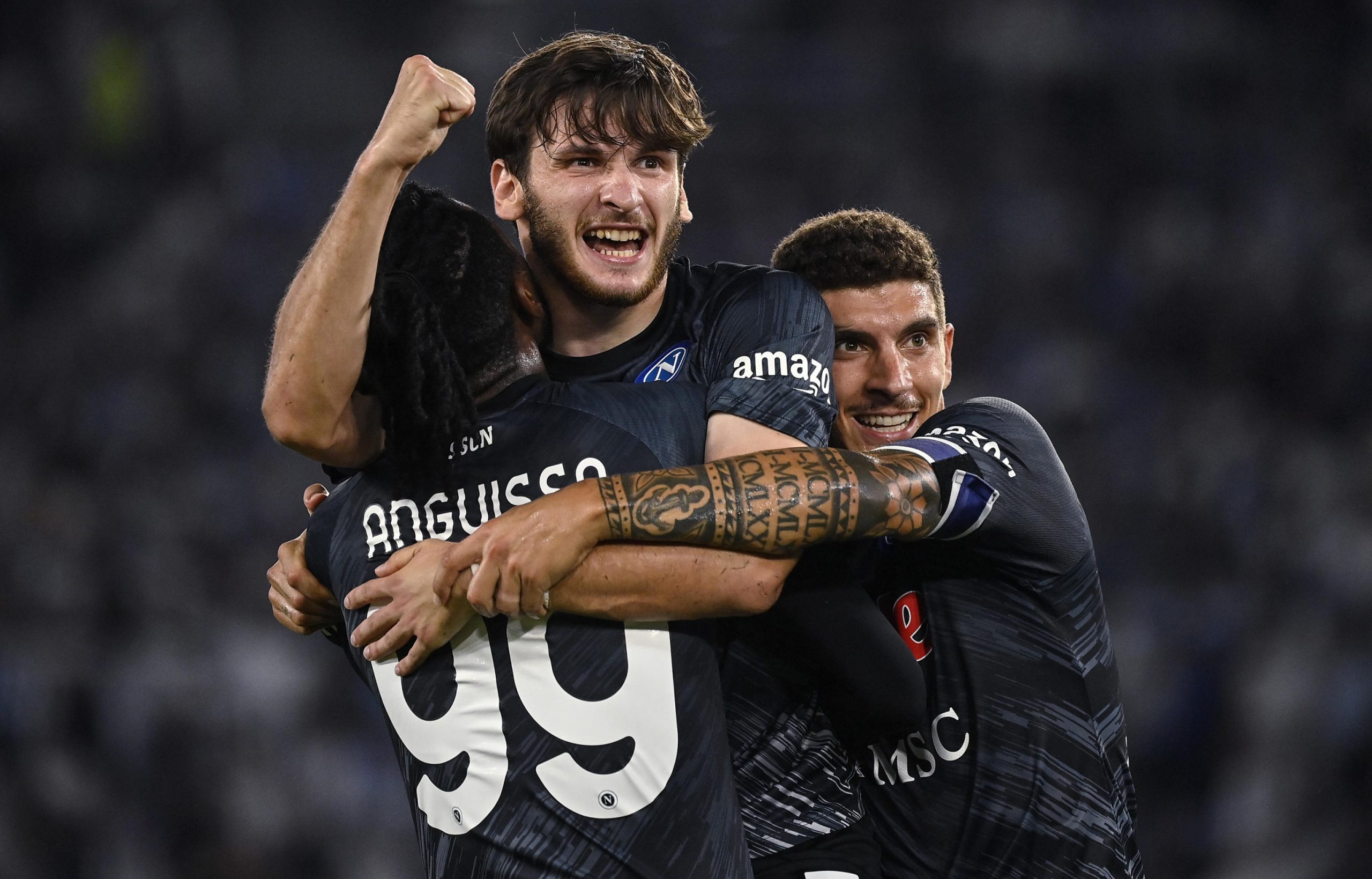 epa10158273 Napoli's Khvicha Kvaratskhelia celebrates (C) after scoring the 1-2 goal during the Italian Serie A soccer match between SS Lazio and SSC Napoli at the Olimpico stadium in Rome, Italy, 03 September 2022.  EPA-EFE/Riccardo Antimiani