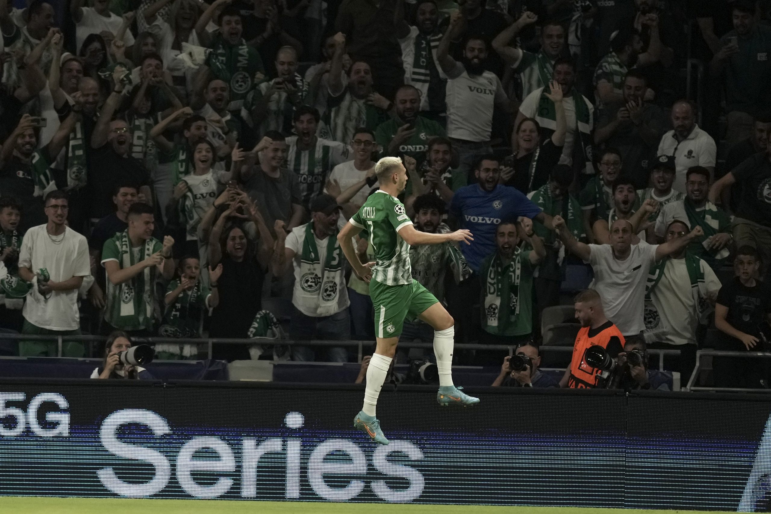 Maccabi's Omer Atzili celebrates after scoring the opening goal of his team during the group H Champions League soccer match between Maccabi Haifa and Juventus at Sammy Ofer stadium, in Haifa, Israel, Tuesday, Oct. 11, 2022. (AP Photo/Ariel Schalit)