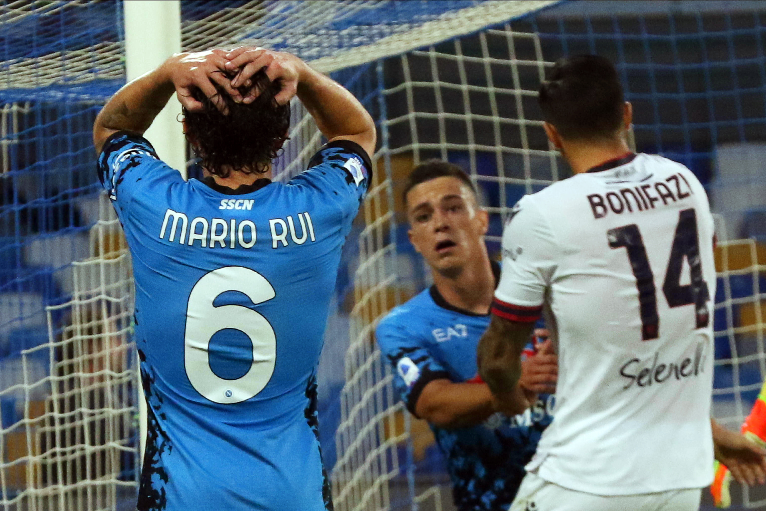 epa10247768 Napoli's Mario Rui (L) reacts during the Italian Serie A soccer match between SSC Napoli and Bologna FC in Naples, Italy, 16 October 2022.  EPA-EFE/CESARE ABBATE