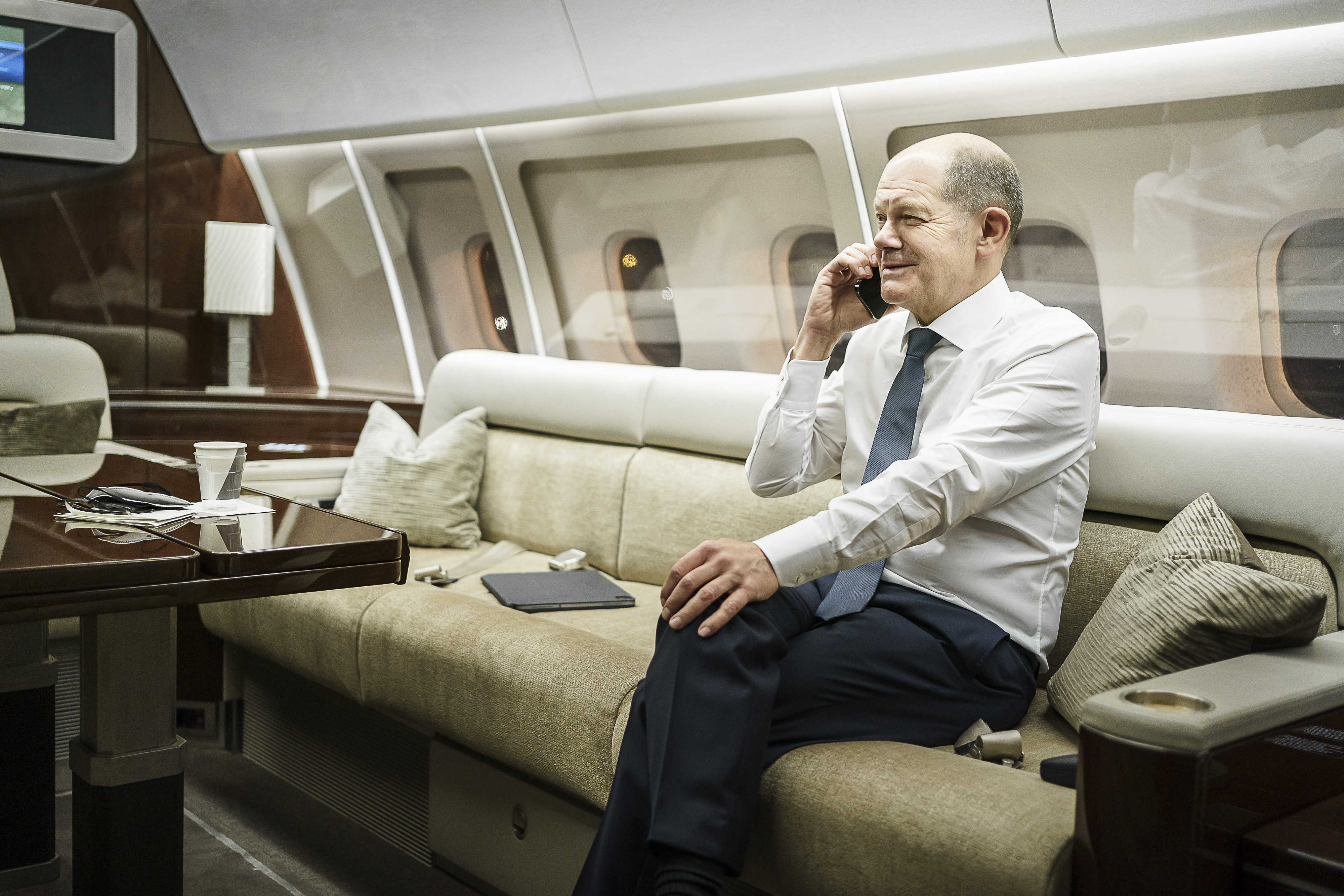 German Chancellor Olaf Scholz speaking on the phone with US President Joe Biden