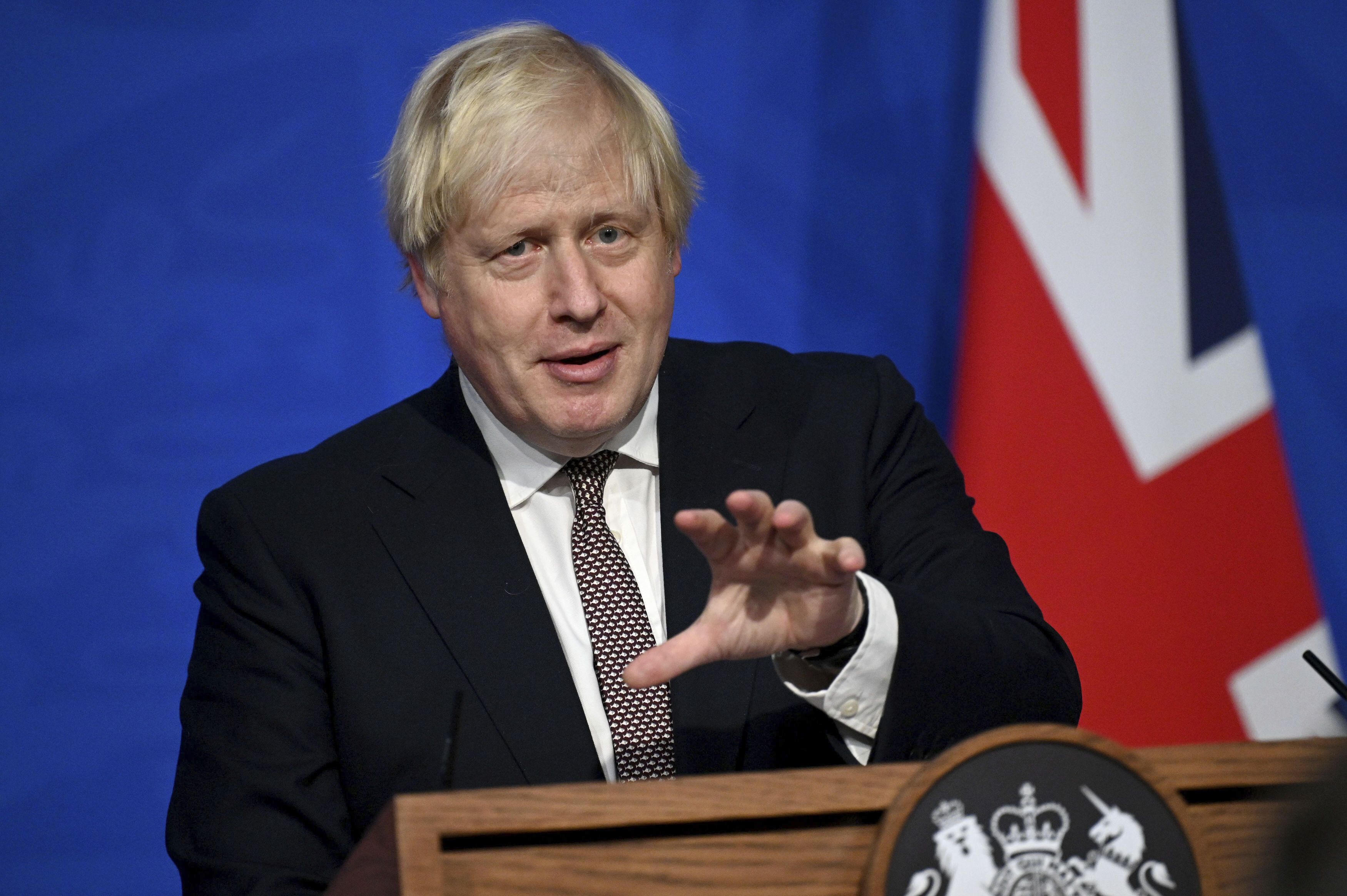 Britain's Prime Minister Boris Johnson addresses the media regarding Britain's COVID-19 infection rate and vaccination campaign, in Downing Street, London, Monday Nov. 15, 2021. (Leon Neal/Pool via AP)