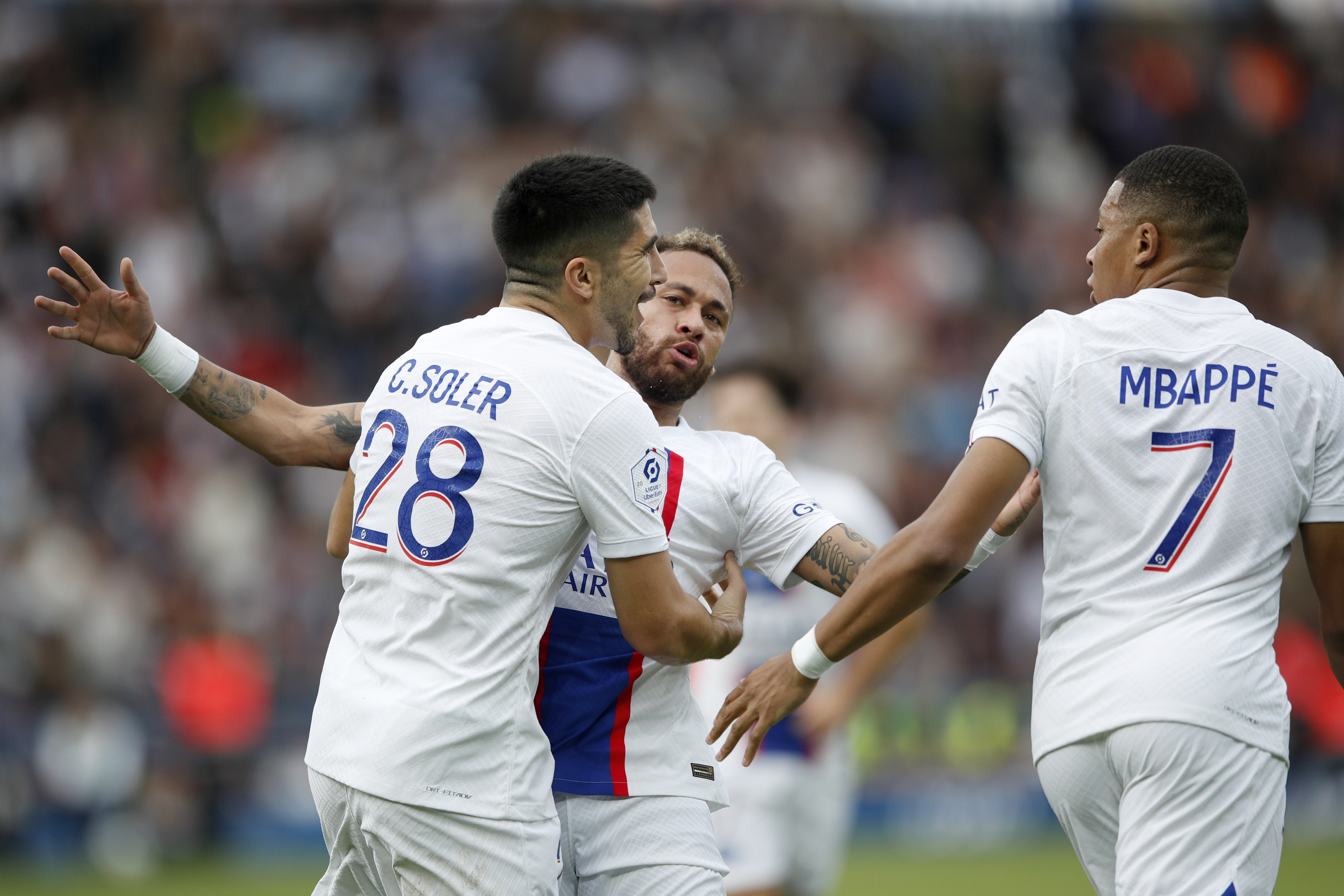 epa10273455 Paris Saint Germain?s Carlos Soler (L) celebrates scoring the 1-1 goal with teammates Neymar Jr (C) and Kylian Mbappe (R) during the French Ligue 1 soccer match between PSG and Troyes, in Paris, France, 29 October 2022.  EPA-EFE/YOAN VALAT