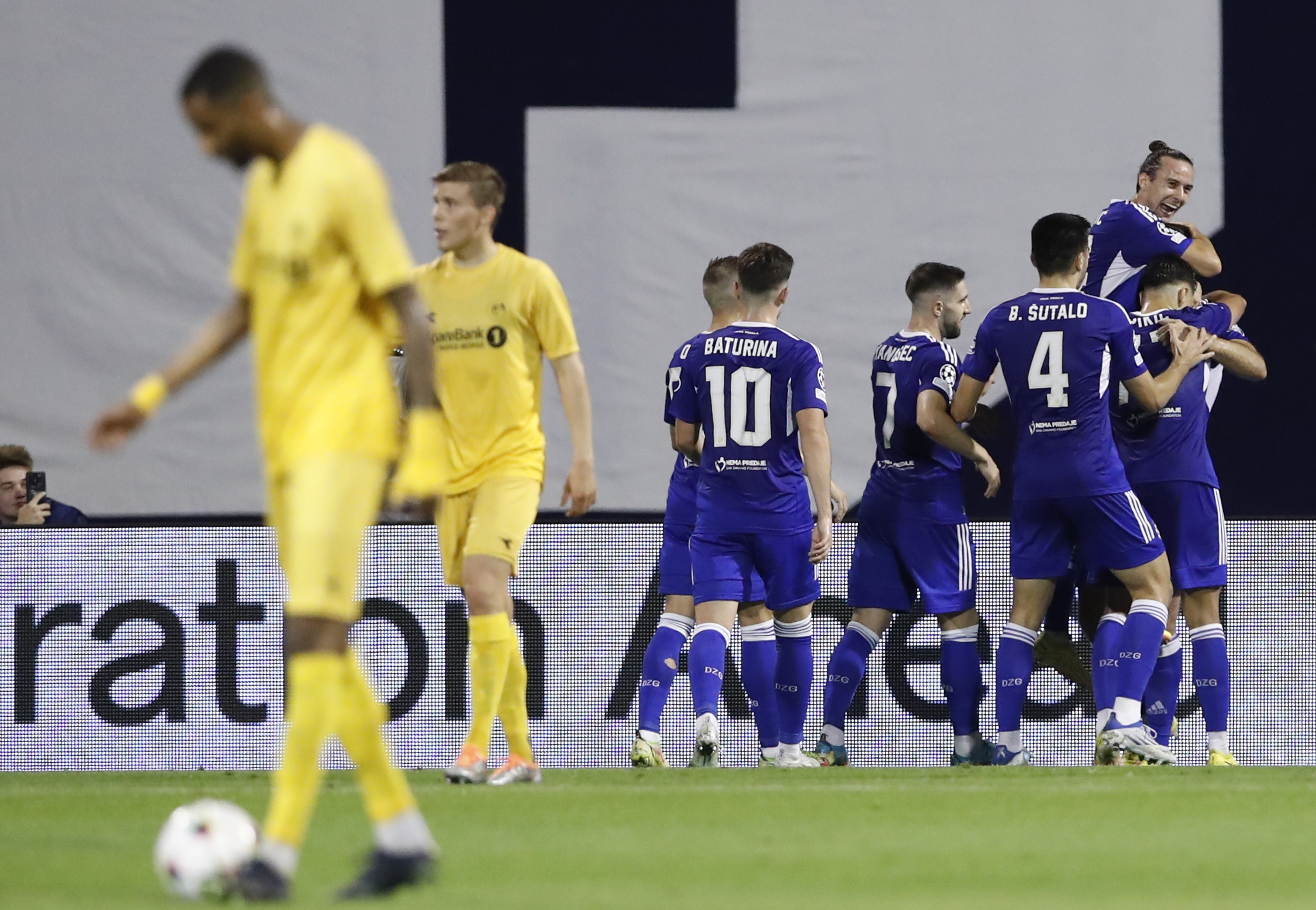 epa10136858 Dinamo's Bruno Petkovic celebrates with teammates after scoring the 2-0 lead during the UEFA Champions League second leg play off match between GNK Dinamo and FK Bodo/Glimt in Zagreb, Croatia, 24 August 2022.  EPA-EFE/ANTONIO BAT