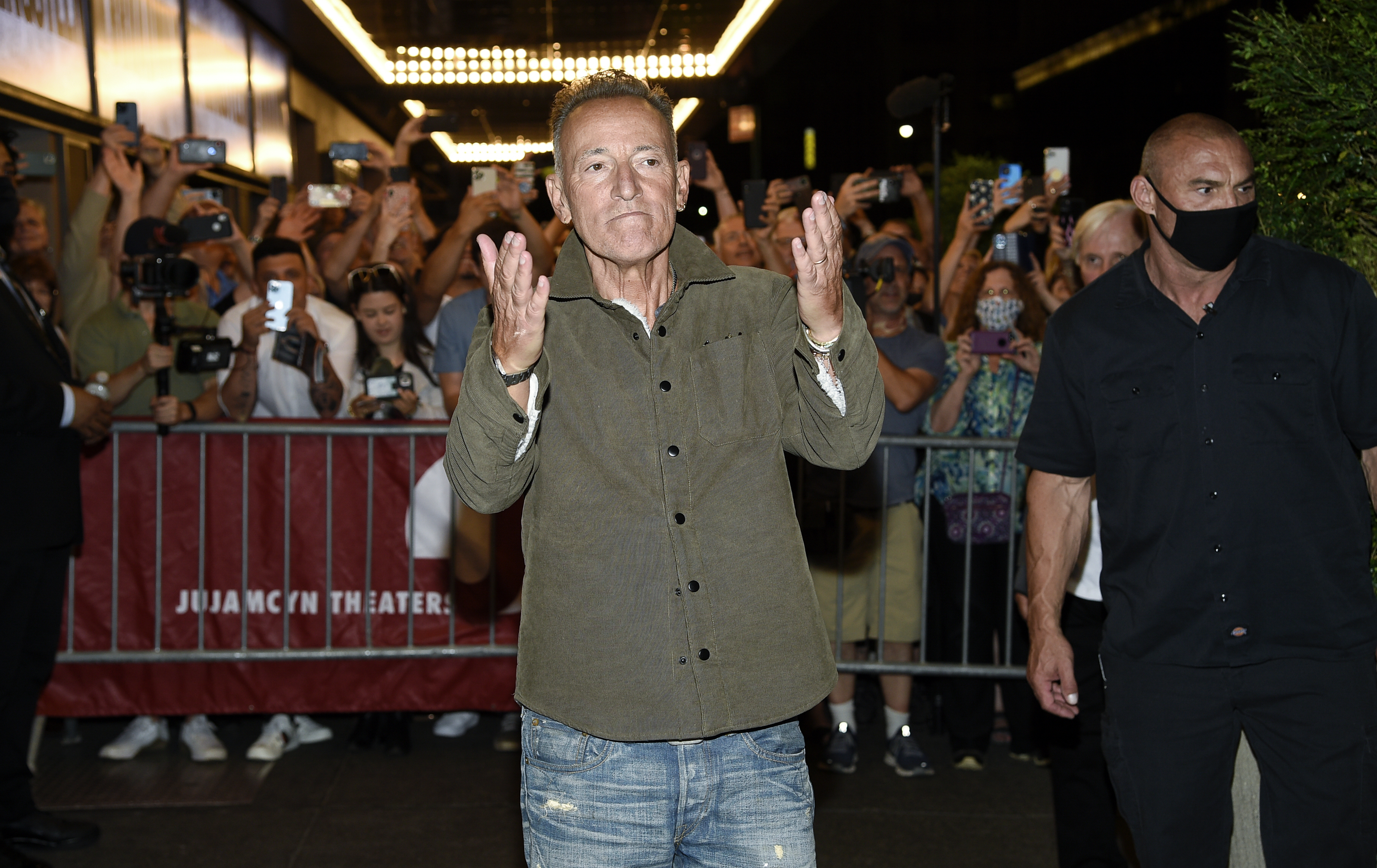 Singer-songwriter Bruce Springsteen exits out the stage door after the "Springsteen On Broadway" reopening night performance at the St. James Theatre on Saturday, June 26, 2021, in New York. (Photo by Evan Agostini/Invision/AP)