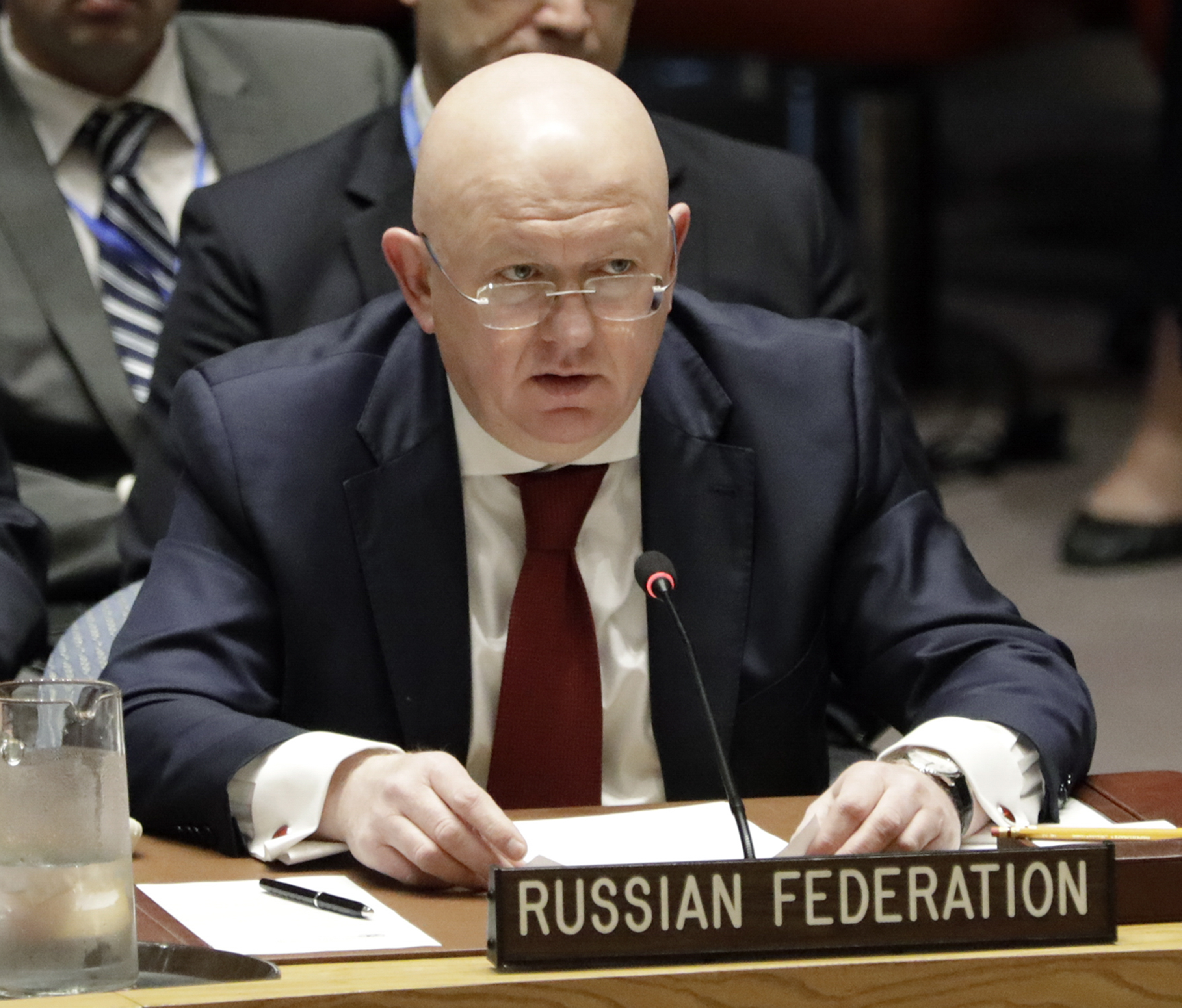 epa06669442 Russia's UN Ambassador Vasily Nebenzya addresses a Security Council meeting on the situation in Syria at United Nations headquarters in New York, New York, USA, 14 April 2018.  EPA-EFE/JASON SZENES