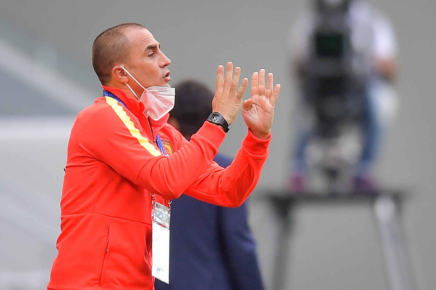 epa08847991 Fabio Cannavaro, head coach of Evergrande gestures during the AFC Champions League group G match between Vissel Kobe and Guangzhou Evergrande at Al-Janoub Stadium in Al-Wakrah, Qatar, 28 November 2020.  EPA-EFE/NOUSHAD THEKKAYIL