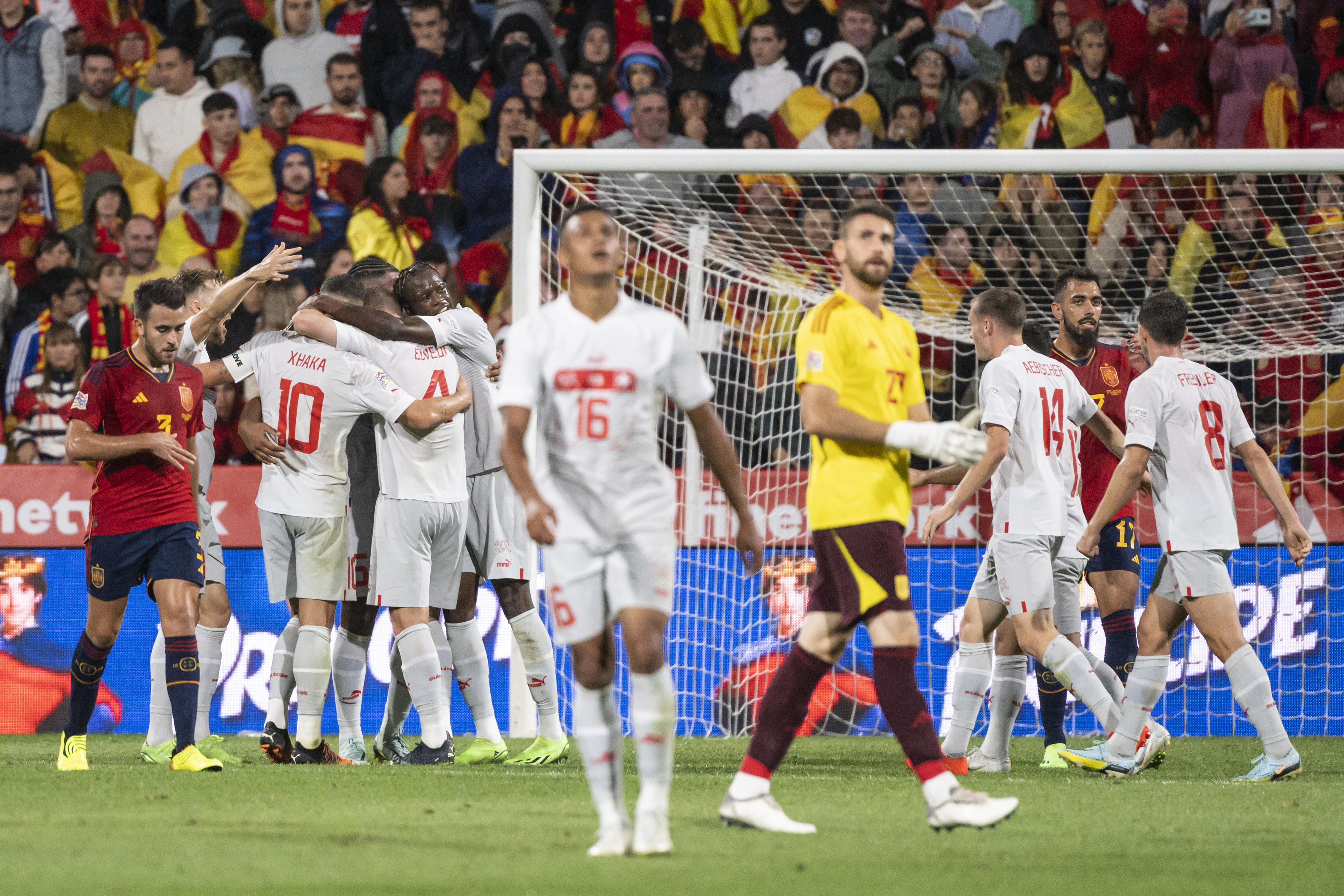epa10204527 Swiss players celebrate after winning the UEFA Nations League soccer match between Spain and Switzerland in Zaragoza, Spain, 24 September 2022.  EPA-EFE/JEAN-CHRISTOPHE BOTT