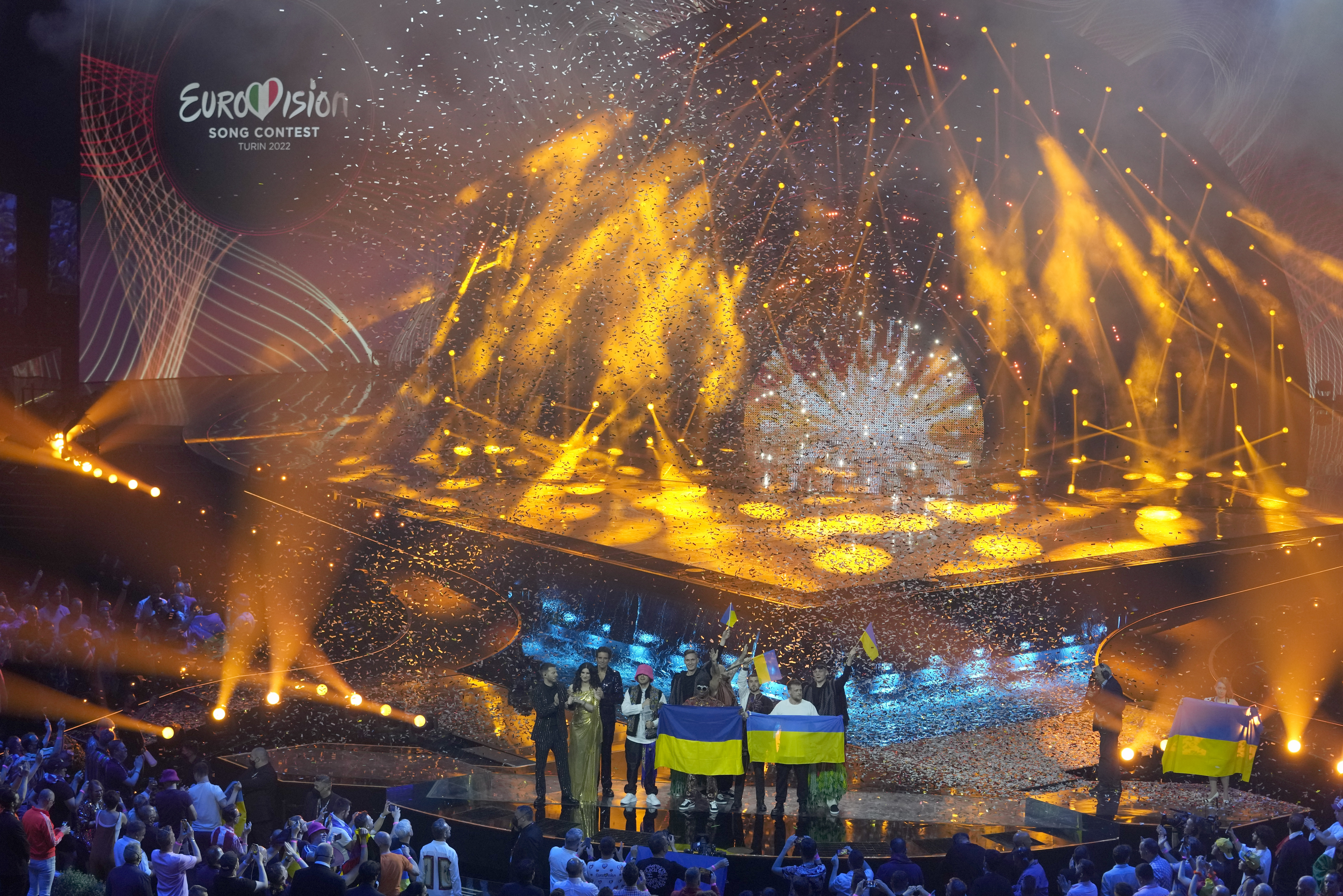 Kalush Orchestra from Ukraine stand on the stage after winning the Grand Final of the Eurovision Song Contest at Palaolimpico arena, in Turin, Italy, Sunday, May 15, 2022. (AP Photo/Luca Bruno)
