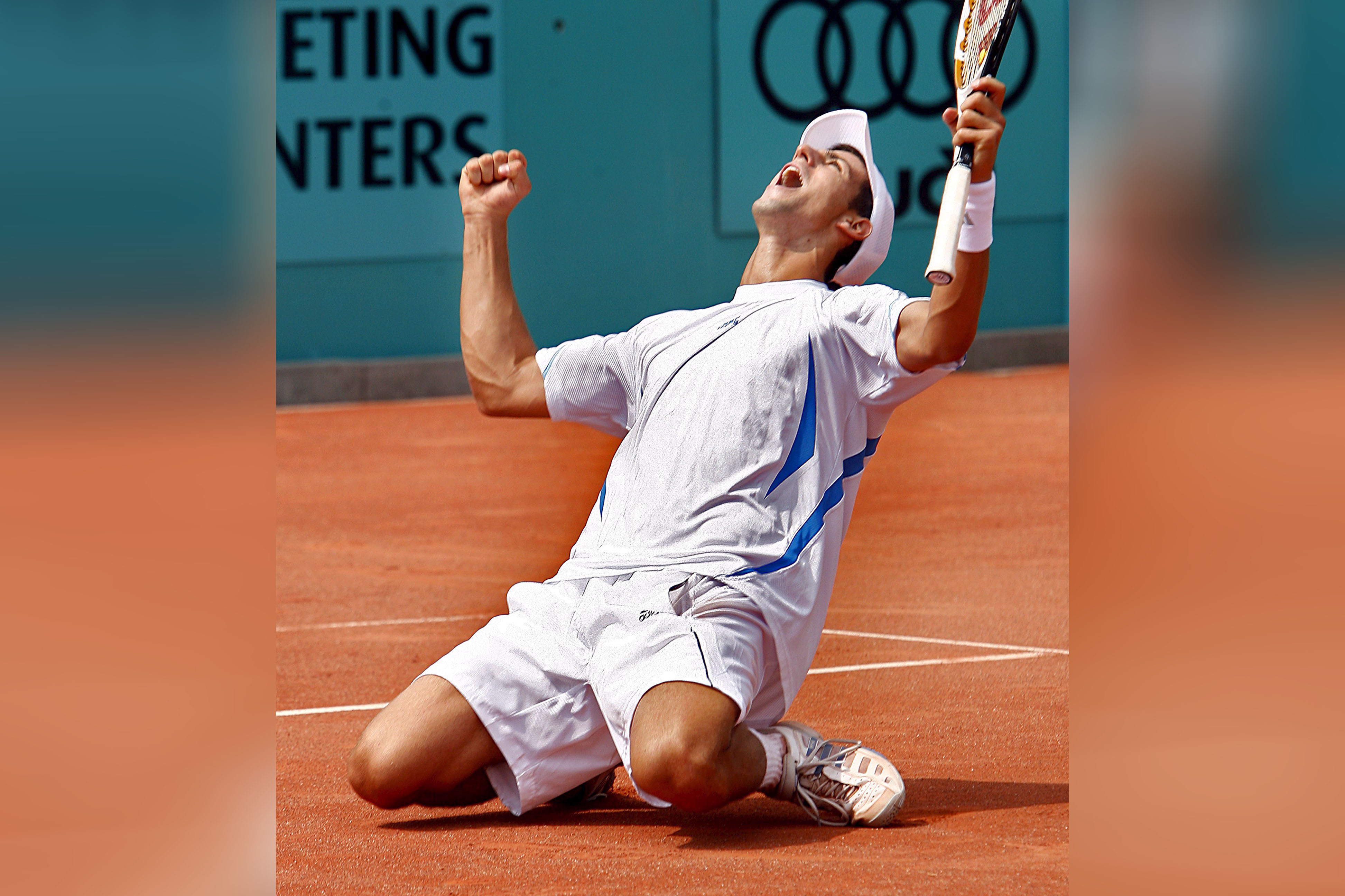 epa00779393 Novak Djokovic of Serbia celebrates after winning the final of the Dutch Open tennis tournament against Nicolas Massu of Chile in Amersfoort, Netherlands, Sunday 23 July 2006. Djokovic won 7-6, 6-4.  EPA/UNITED PHOTOS/TOUSSAINT KLUITERS