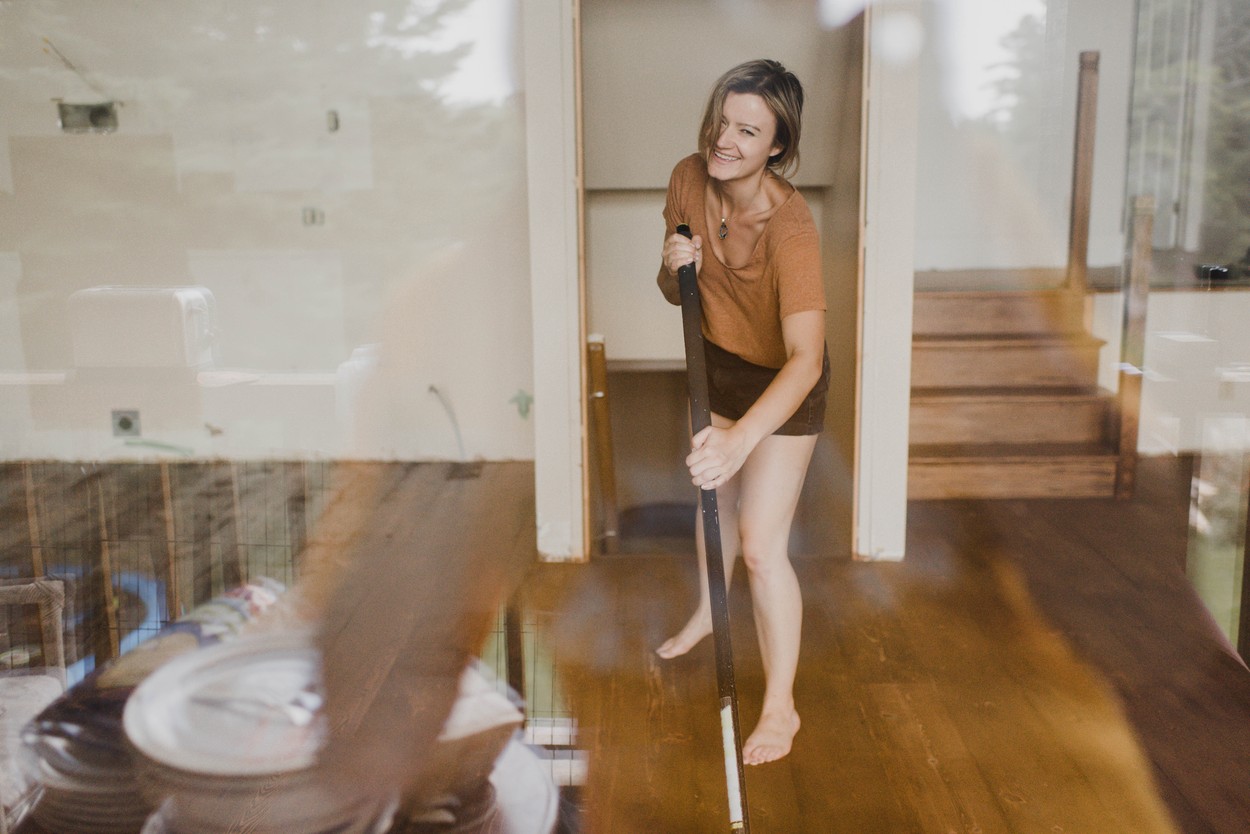 Woman cleaning new home