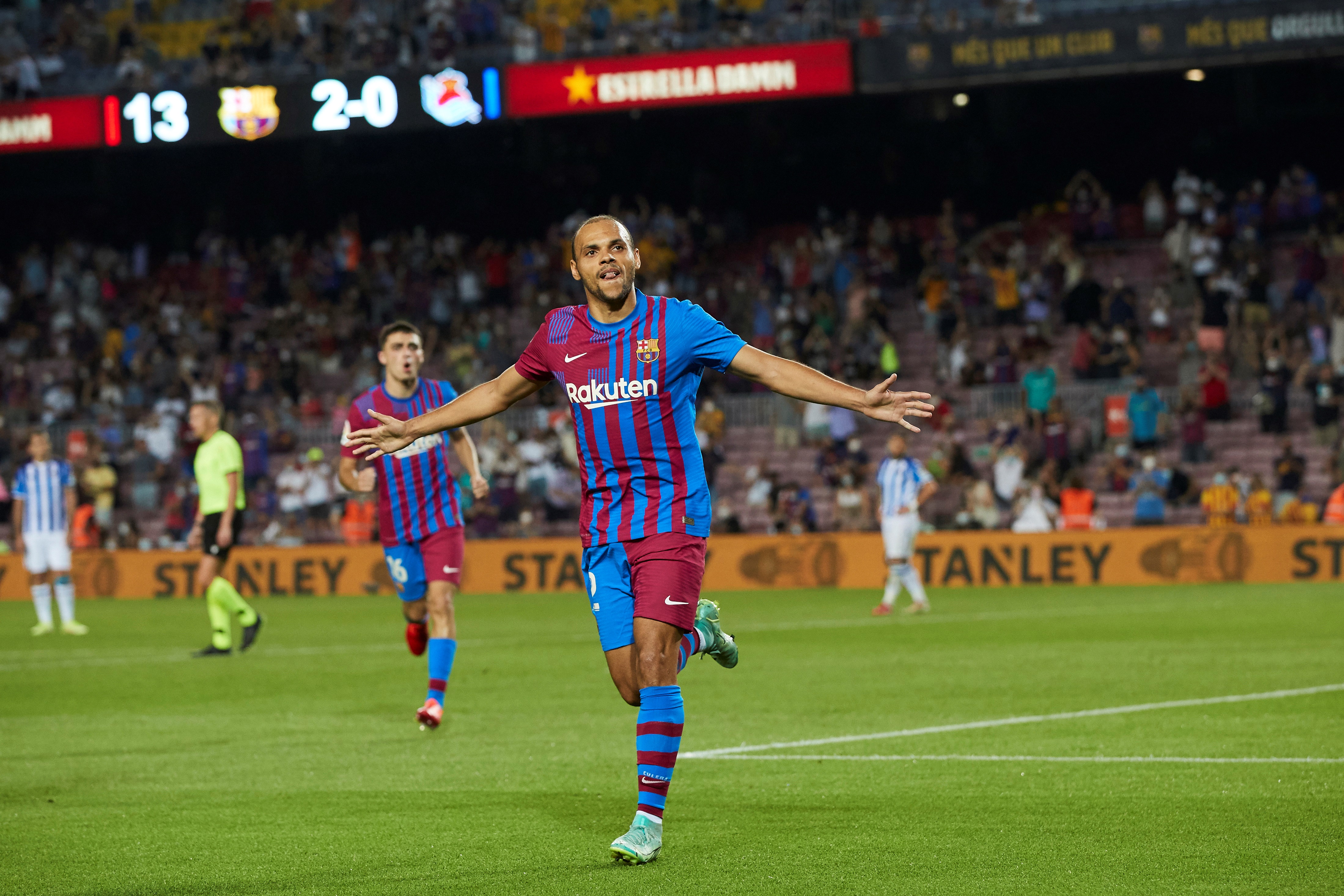 epa09415775 FC Barcelona's Martin Braithwaite celebrates after scoring the 3-0 lead during a Spanish LaLiga soccer match between FC Barcelona and Real Sociedad at Camp Nou in Barcelona, Spain, 15 August 2021.  EPA-EFE/Alejandro Garcia