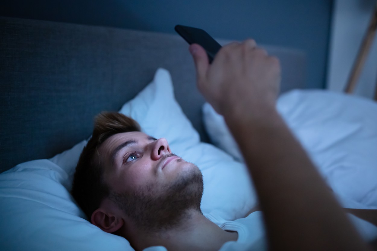 Man In Bed With Mobile Phone At Night,Image: 529000658, License: Royalty-free, Restrictions: , Model Release: yes, Credit line: Andriy Popov / Panthermedia / Profimedia