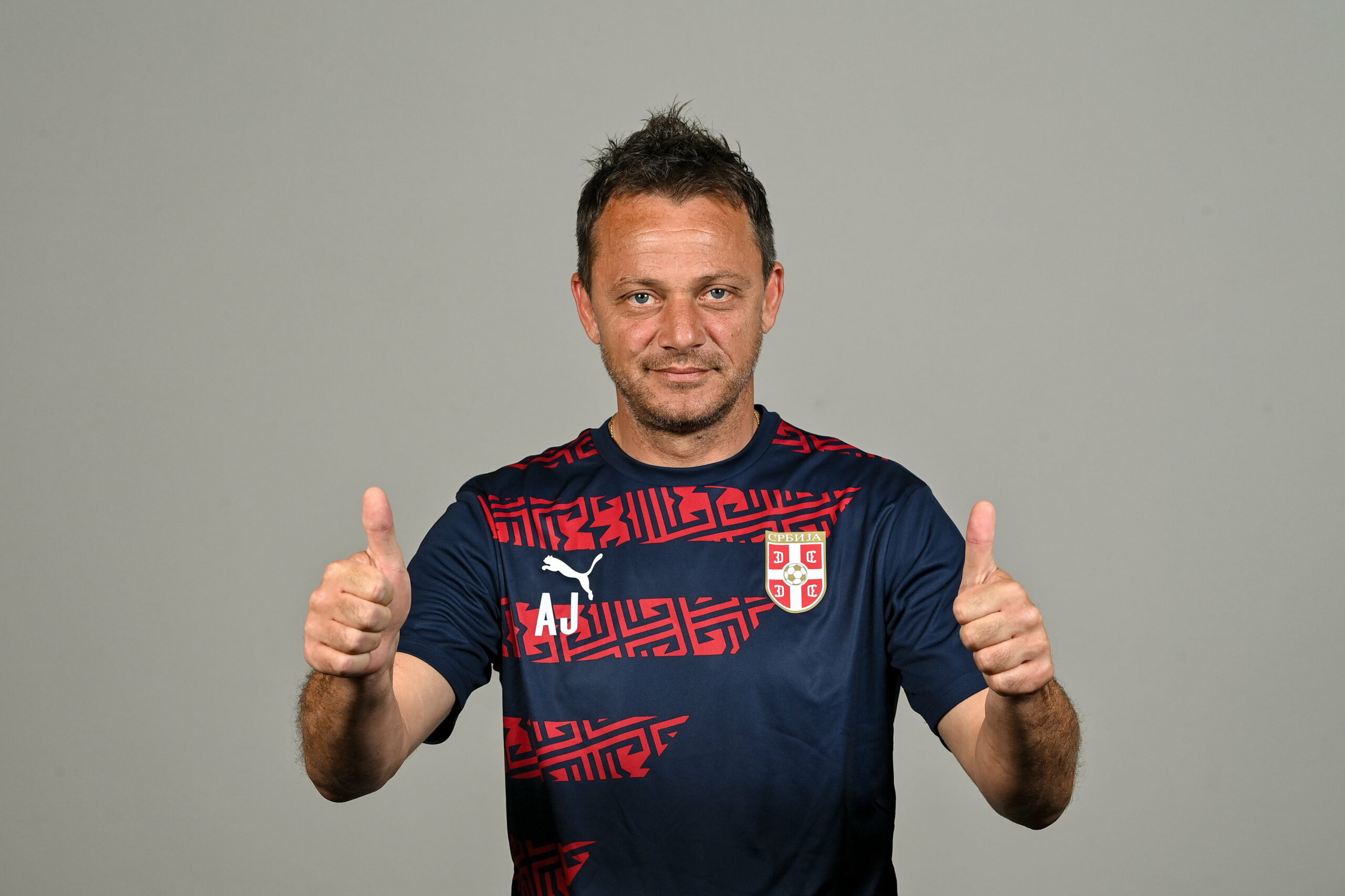 VYHNE, SLOVAKIA - June 17: Head coach Aleksandar Jovic during a Serbia squad portrait session before the UEFA European Under-19 Championship Finals, on June 17, 2022 at Hotel Termál, Vyhne, Slovakia. (Photo by Seb Daly - UEFA/UEFA via Sportsfile)