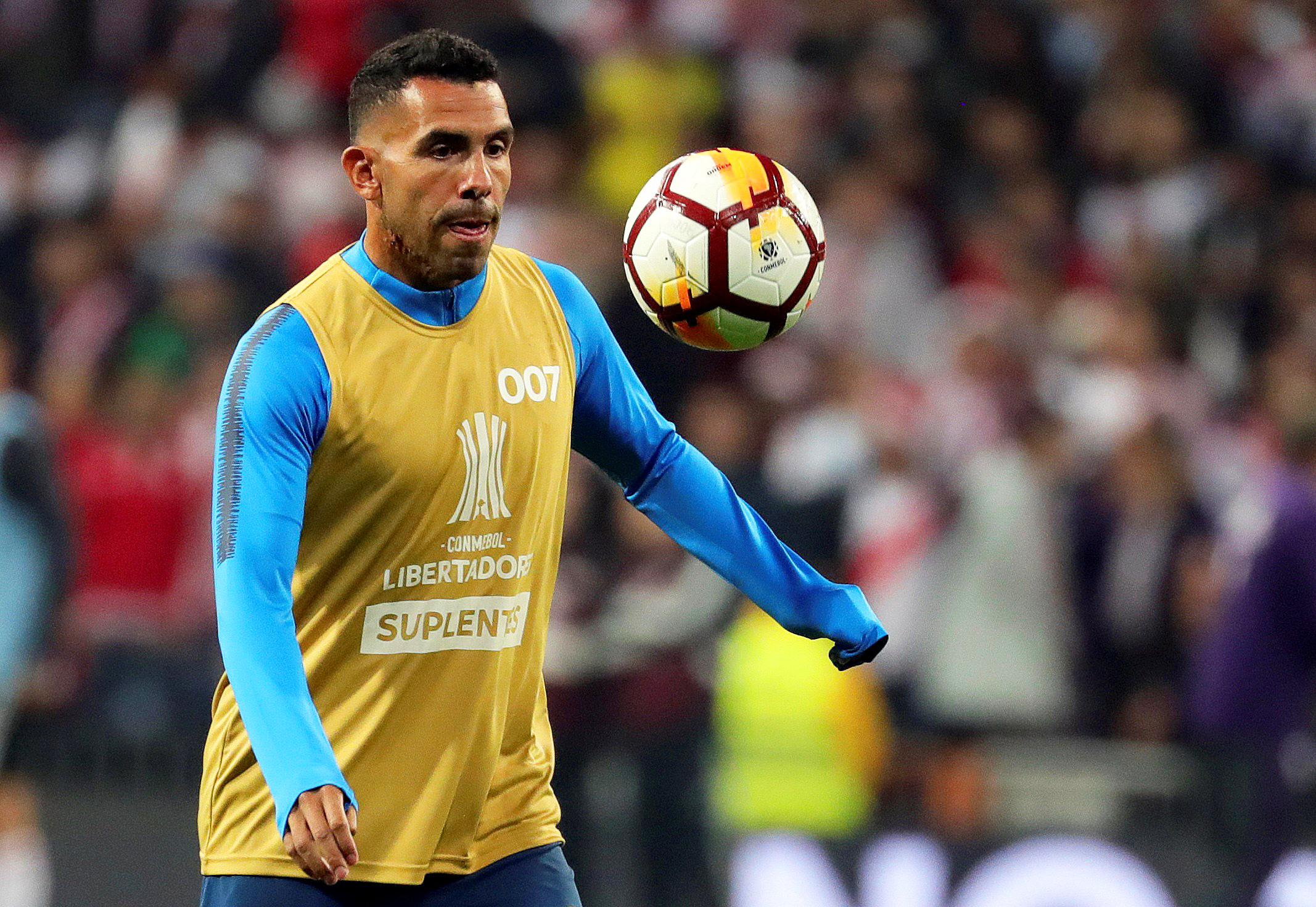 epa07220368 Boca Juniors' striker Carlos Tevez warms up for the Copa Libertadores final, second leg soccer match between River Plate and Boca Juniors at the Santiago Bernabeu stadium in Madrid, Spain, 09 December 2018.  EPA-EFE/JUANJO MARTIN