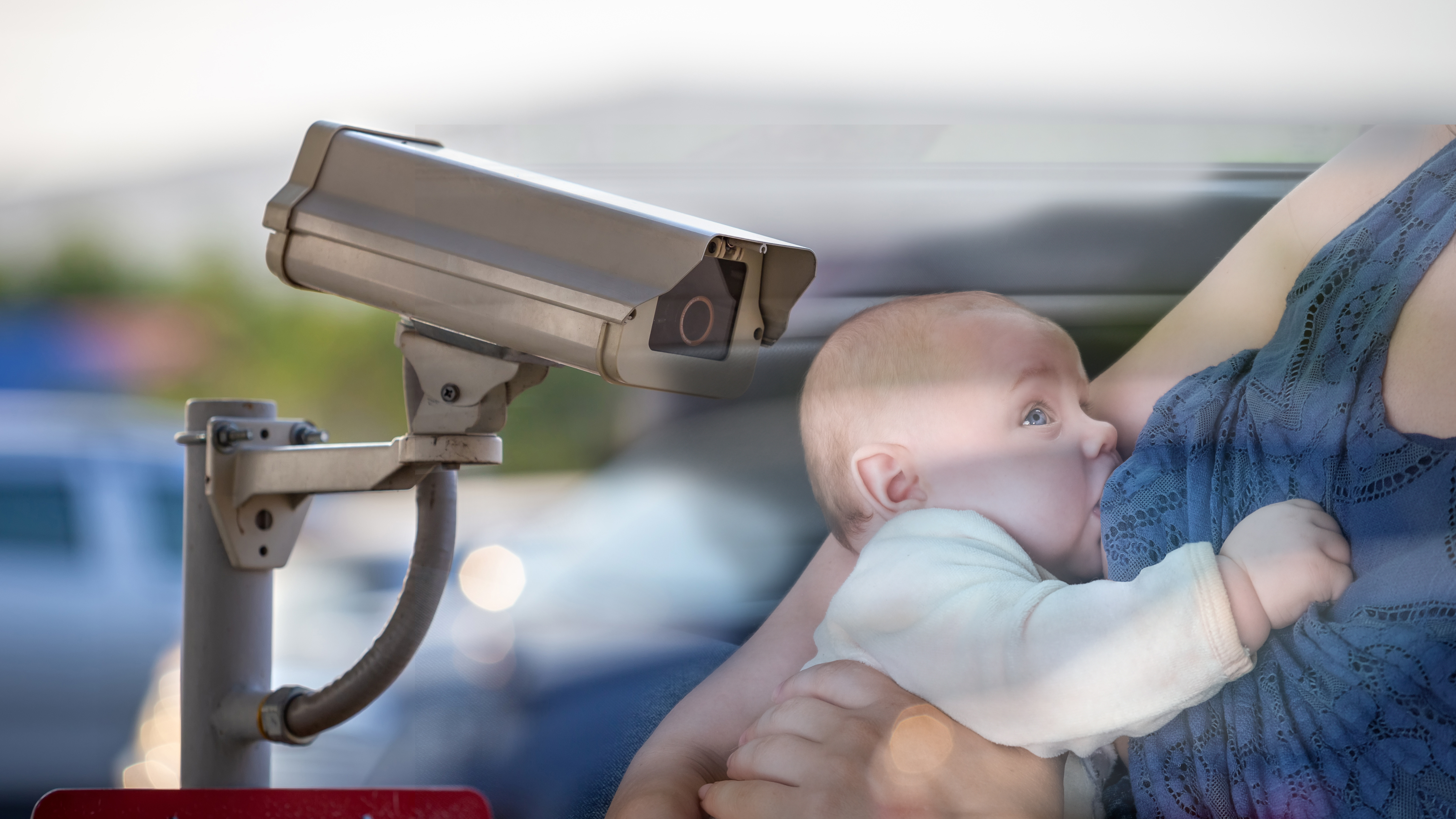 parking, kazna, dojenje u autu, majka, beba CCTV camera for security at parking, close up