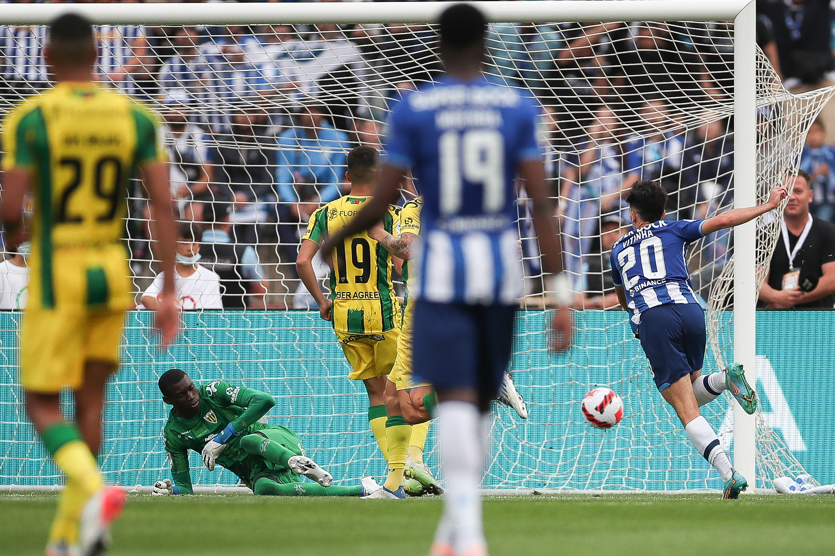 epa09966981 FC Porto's Vitinha (R) scores the 2-0 goal during the Portugal Cup final soccer match between FC Porto and CD Tondela at Jamor National stadium in Oeiras, outskirts of Lisbon, Portugal, 22 May 2022.  EPA-EFE/RODRIGO ANTUNES