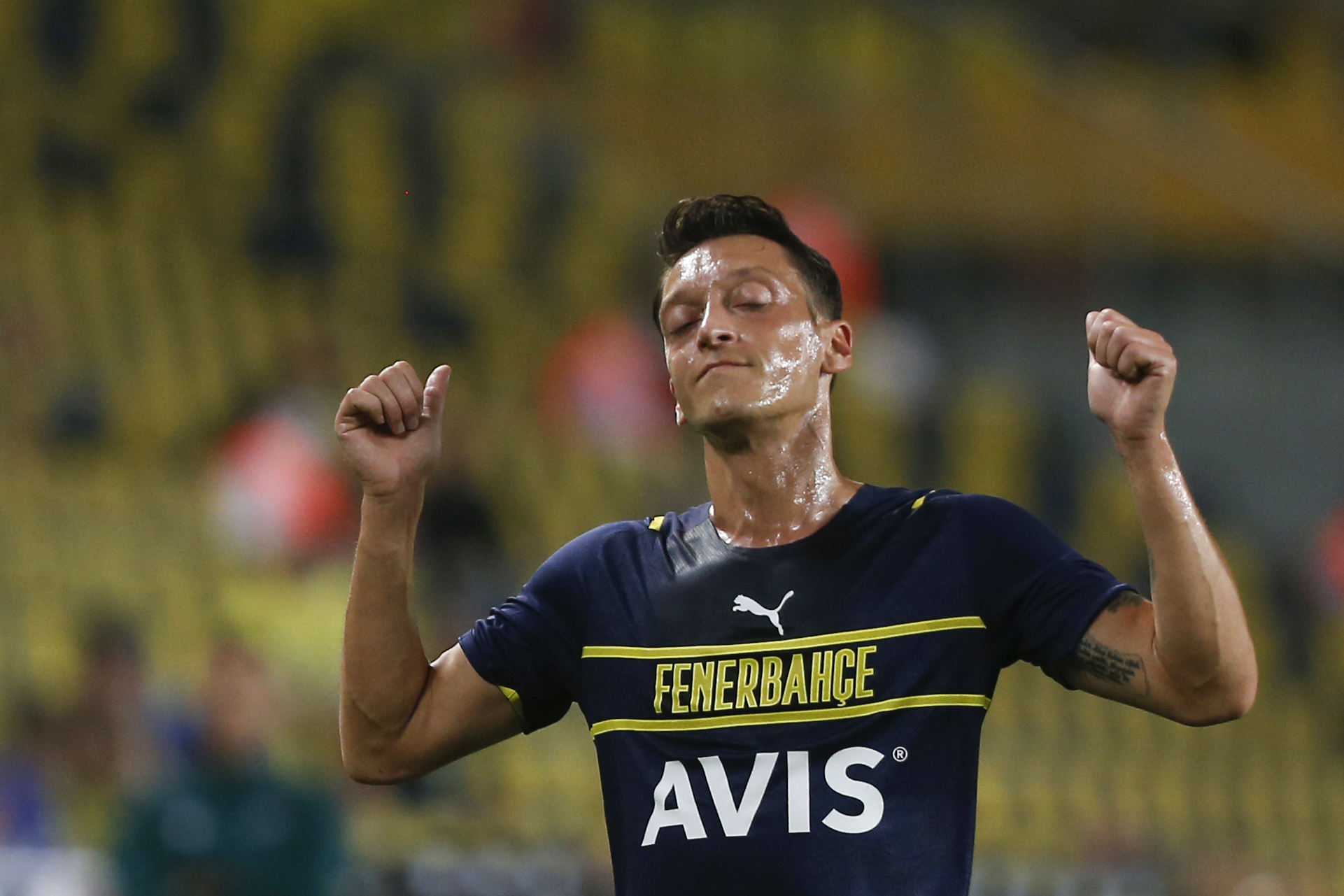 epa09421111 Mesut Ozil of Fenerbahce reacts during the UEFA Europa League Play-off first leg soccer match between Fenerbahce and HJK Helsinki in Istanbul, Turkey, 19 August 2021  EPA-EFE/ERDEM SAHIN