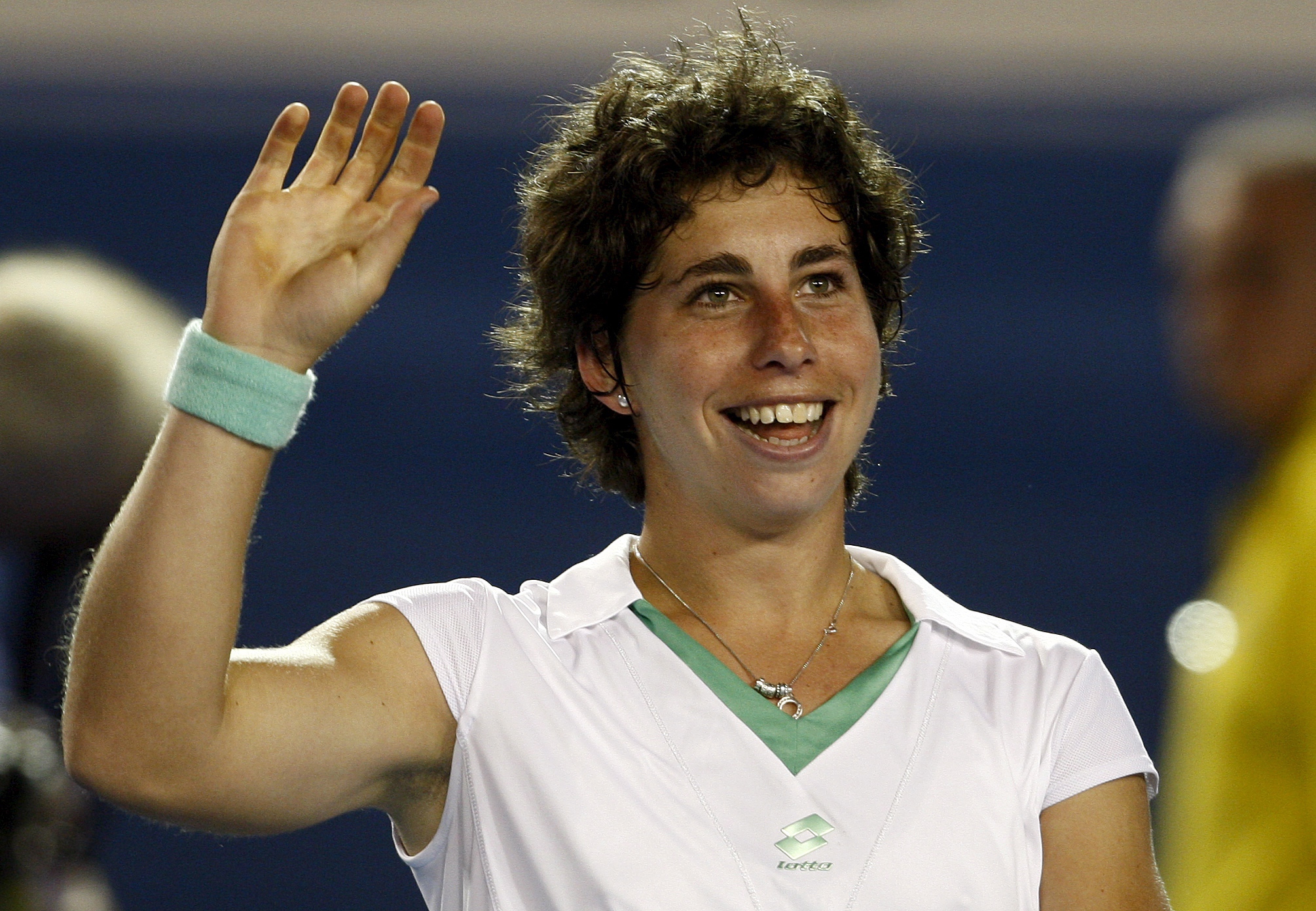 epa01609090 Spanish  Carla Suarez Navaro celebrates after she won her second round match against US Venus Williams at the Australian Open tennis tournament in Melbourne, Australia, 22 January 2009.  EPA/OLIVER WEIKEN