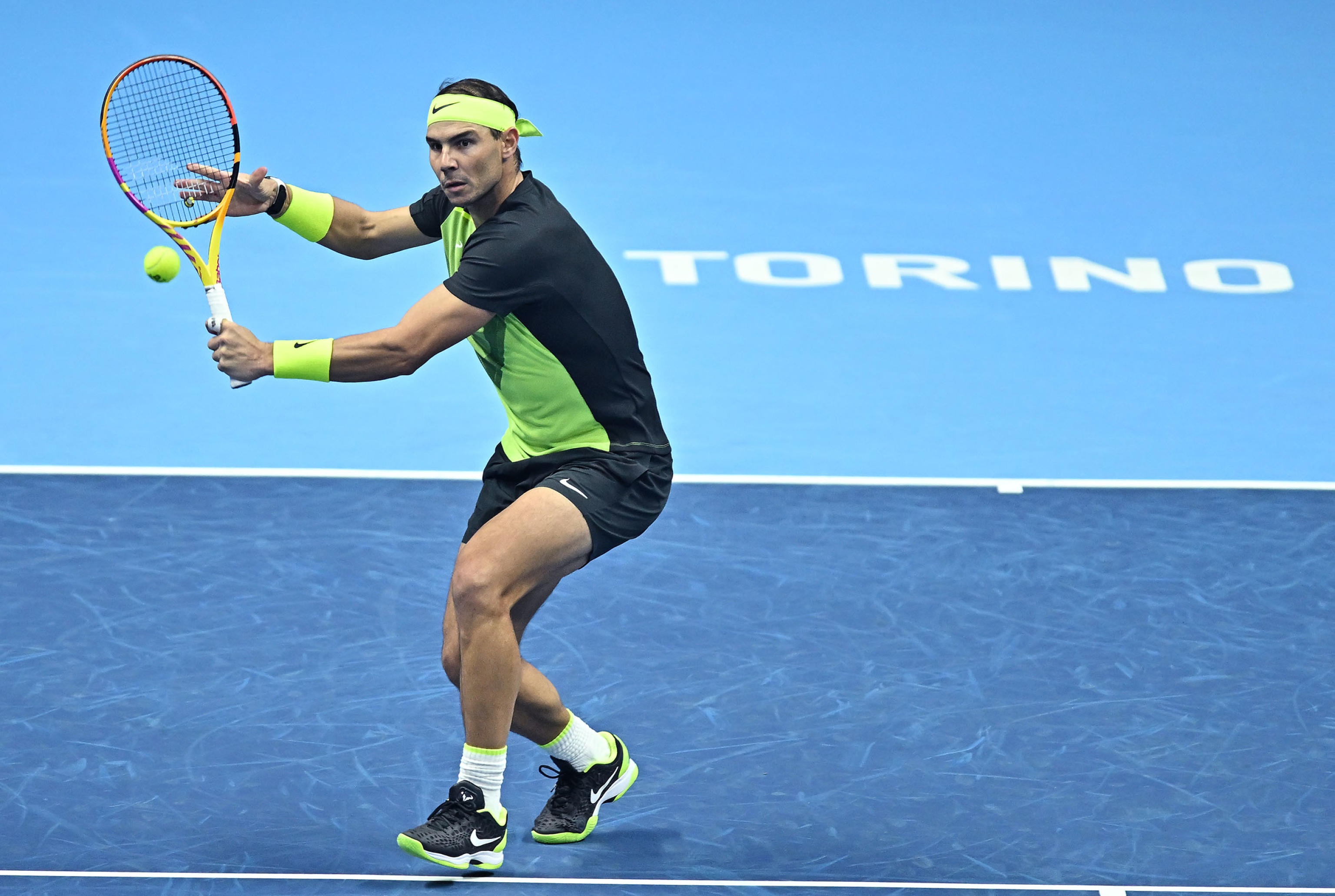epa10307086 Rafael Nadal of Spain in action against Felix Auger-Aliassime of Canada during a Singles round robin match of the ATP Finals 2022 at the Pala Alpitour in Turin, Italy, 15 November 2022.  EPA-EFE/Alessandro Di Marco