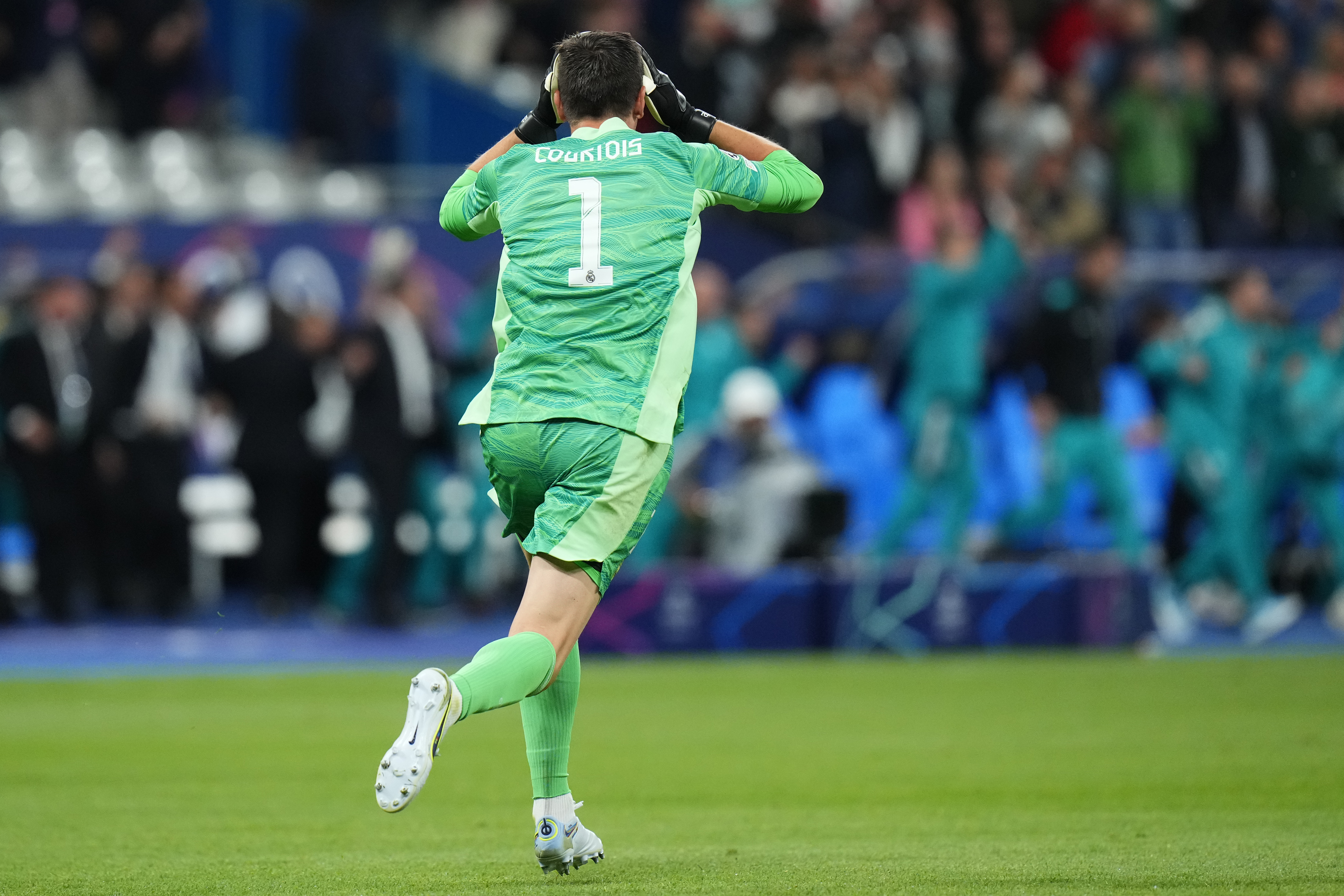 Real Madrid's goalkeeper Thibaut Courtois celebrates after the Champions League final soccer match between Liverpool and Real Madrid at the Stade de France in Saint Denis near Paris, Saturday, May 28, 2022. Real won 1-0. (AP Photo/Petr David Josek)