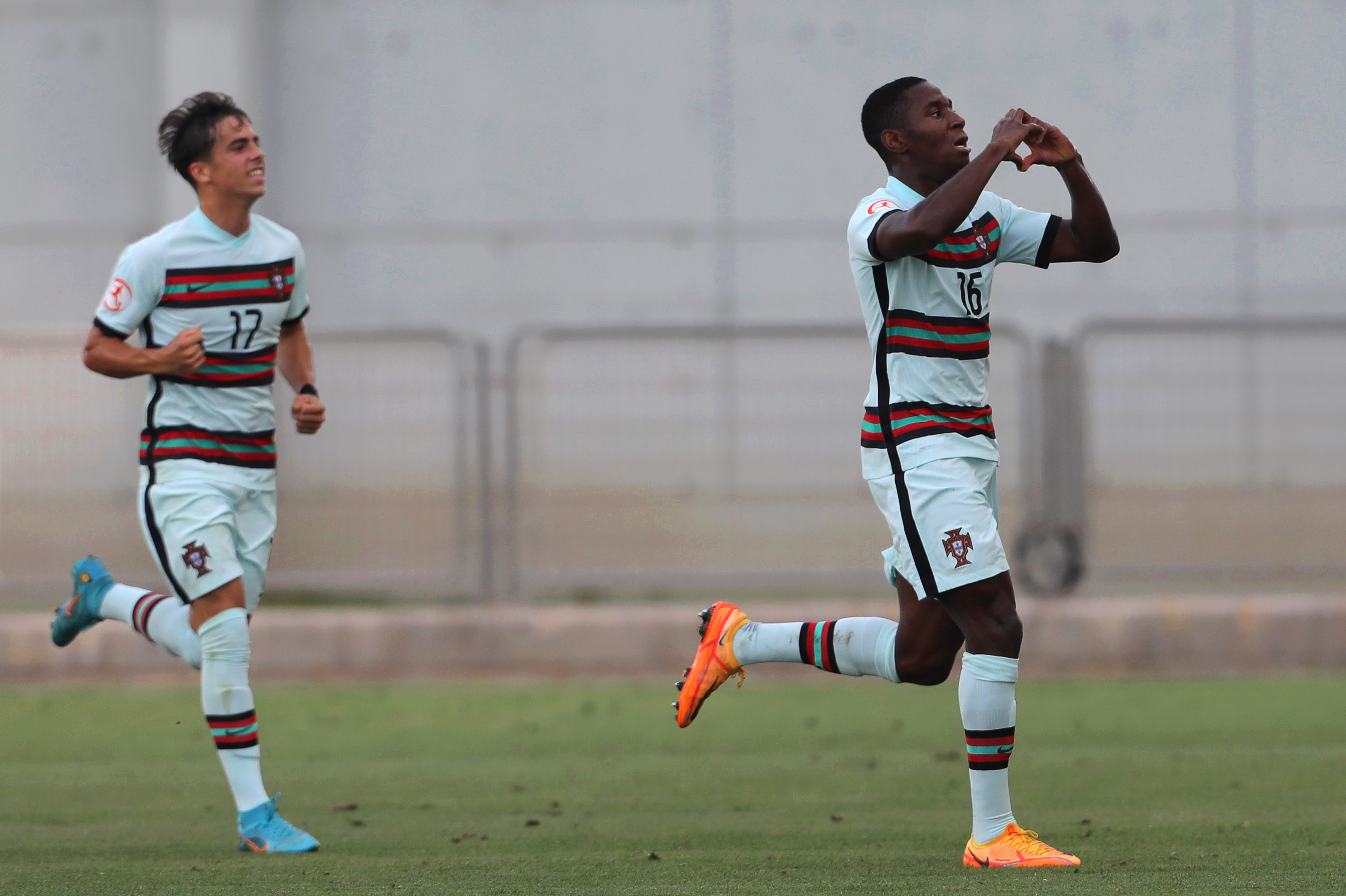 epa09984334 Dario Essugo (R) of Portugal celebrates after scoring the 2-1 lead during the semi final match between France and Portugal at the UEFA European Under-17 Championship in Netanya, Israel, 29 May 2022.  EPA-EFE/ABIR SULTAN
