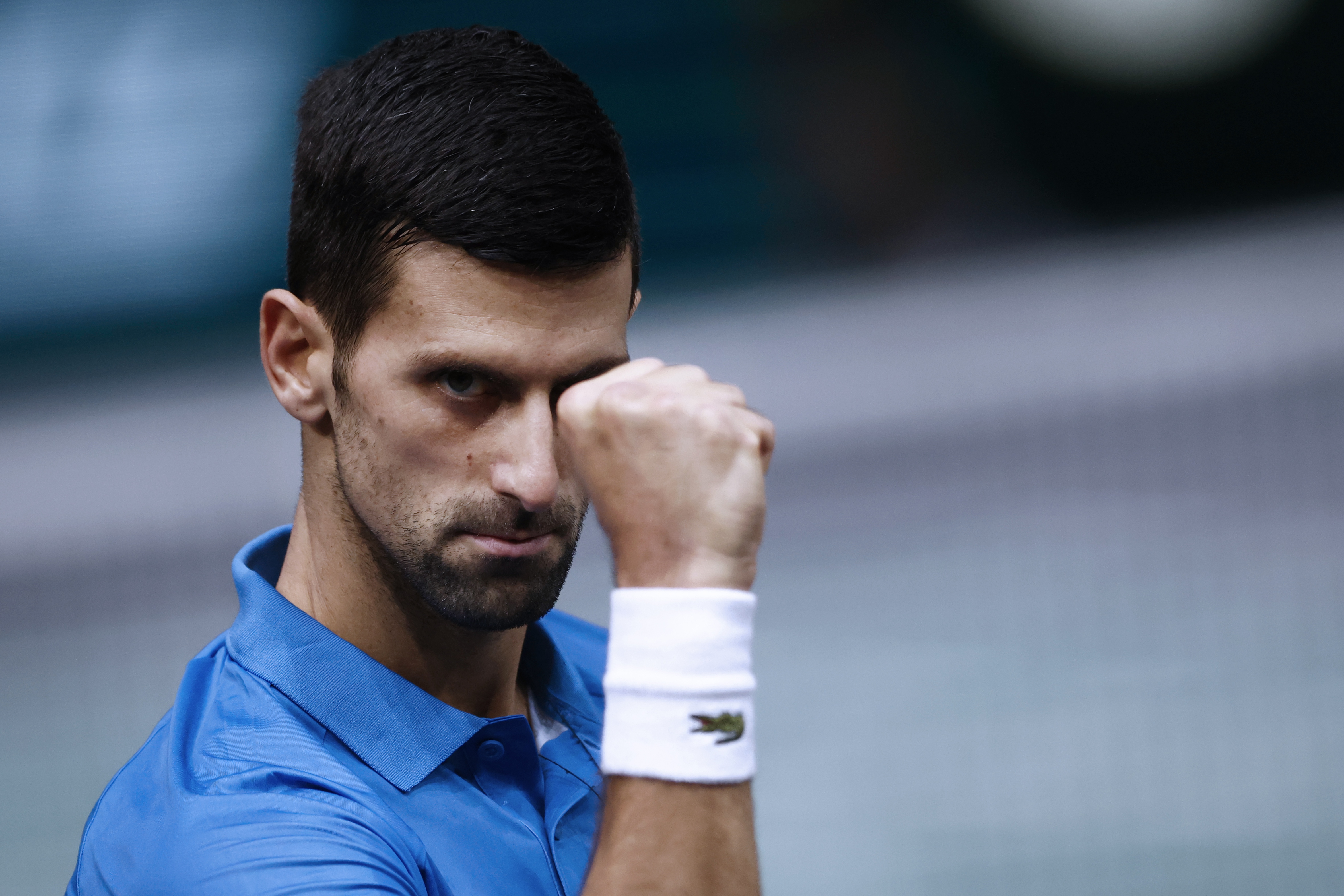 epa10288216 Novak Djokovic of Serbia in action during his semi final match against Stefanos Tsitsipas of Greece at the Rolex Paris Masters tennis tournament in Paris, France, 05 November 2022.  EPA-EFE/YOAN VALAT