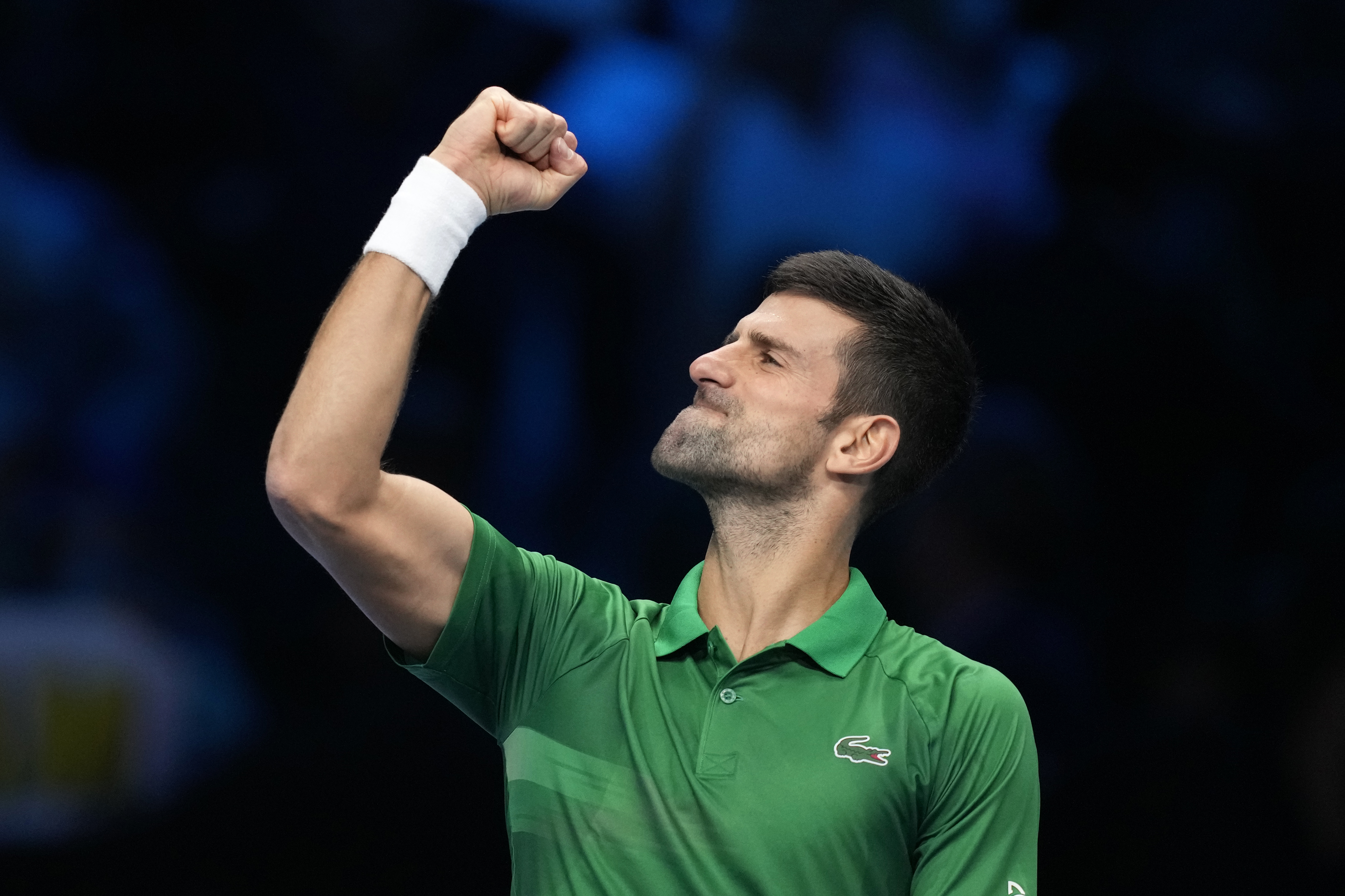 Serbia's Novak Djokovic celebrates after winning against Greece's Stefanos Tsitsipas during their singles tennis match of the ATP World Tour Finals, at the Pala Alpitour in Turin, Italy, Monday, Nov. 14, 2022. (AP Photo/Antonio Calanni)