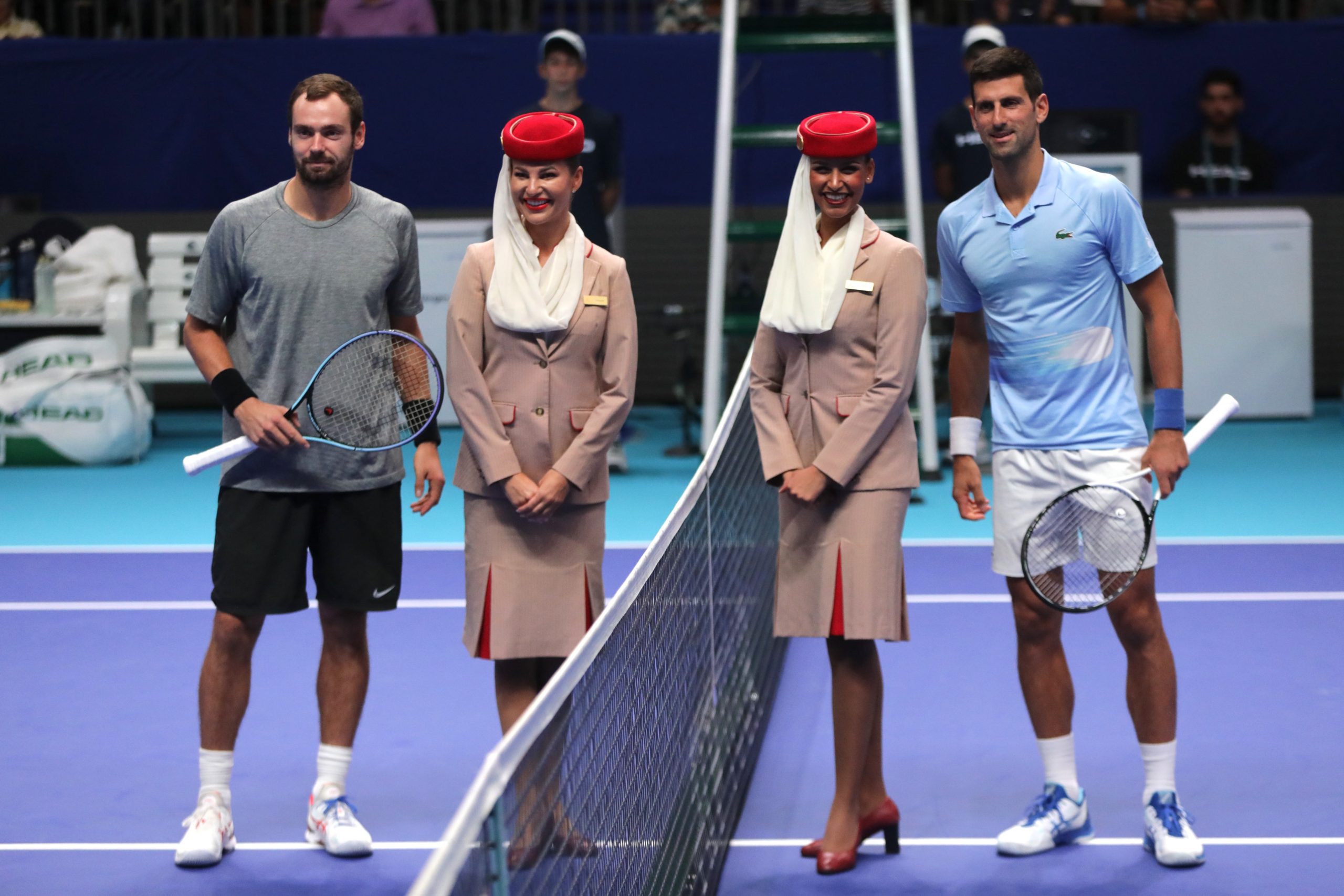 epa10218212 Serbian tennis player Novak Djokovic (R) and  in Roman Safiullin (L) of Russia pose for pictures ahead of their semi final match at the  Tel Aviv Open tennis tournament in Tel Aviv, Israel, 01 October 2022.  EPA-EFE/ABIR SULTAN