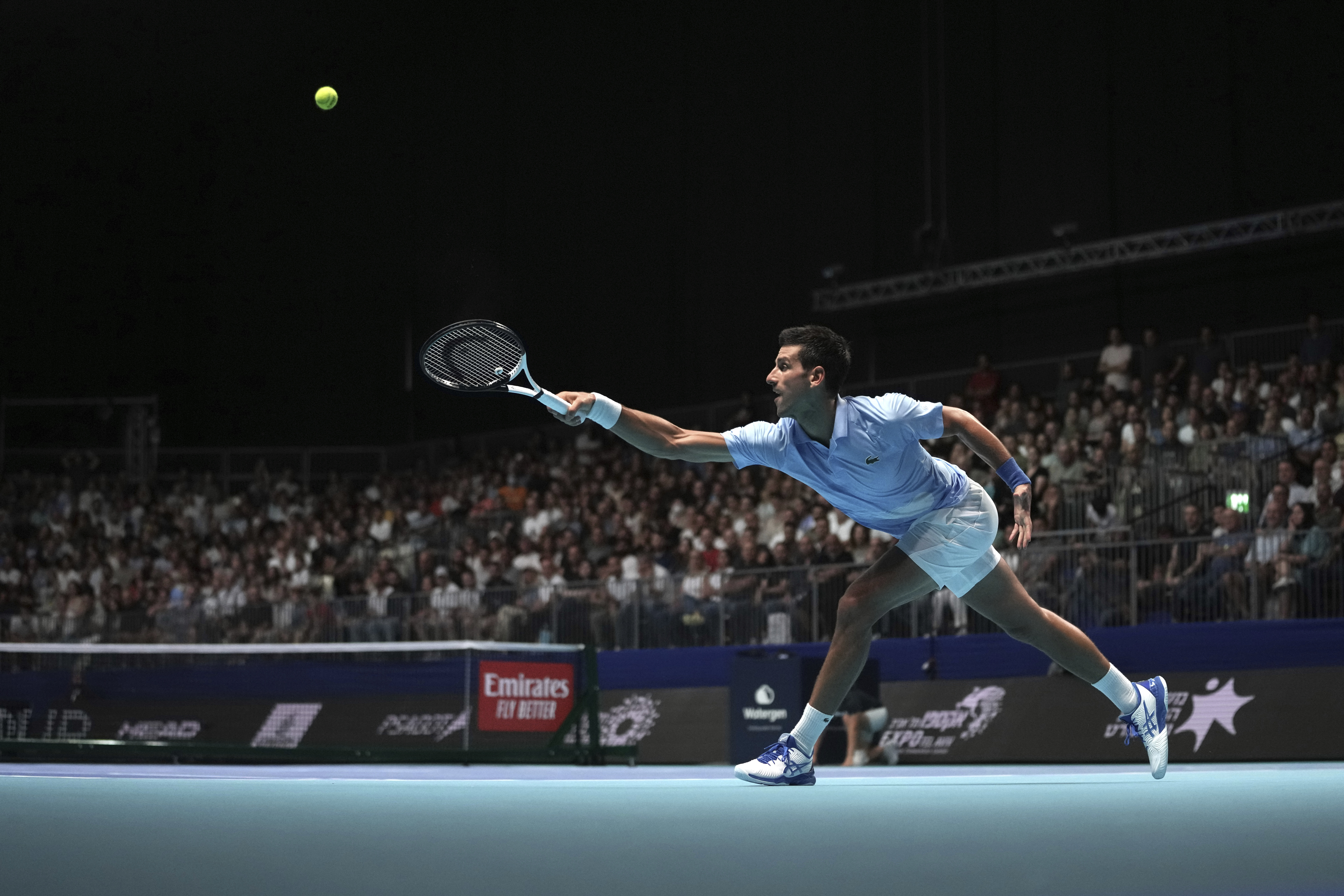 Serbia's Novak Djokovic plays against Croatia's Marin Cilic during their final tennis match of the ATP 250 Tel Aviv open in Tel Aviv, Israel, Sunday, Oct. 2, 2022. (AP Photo/Ariel Schalit)