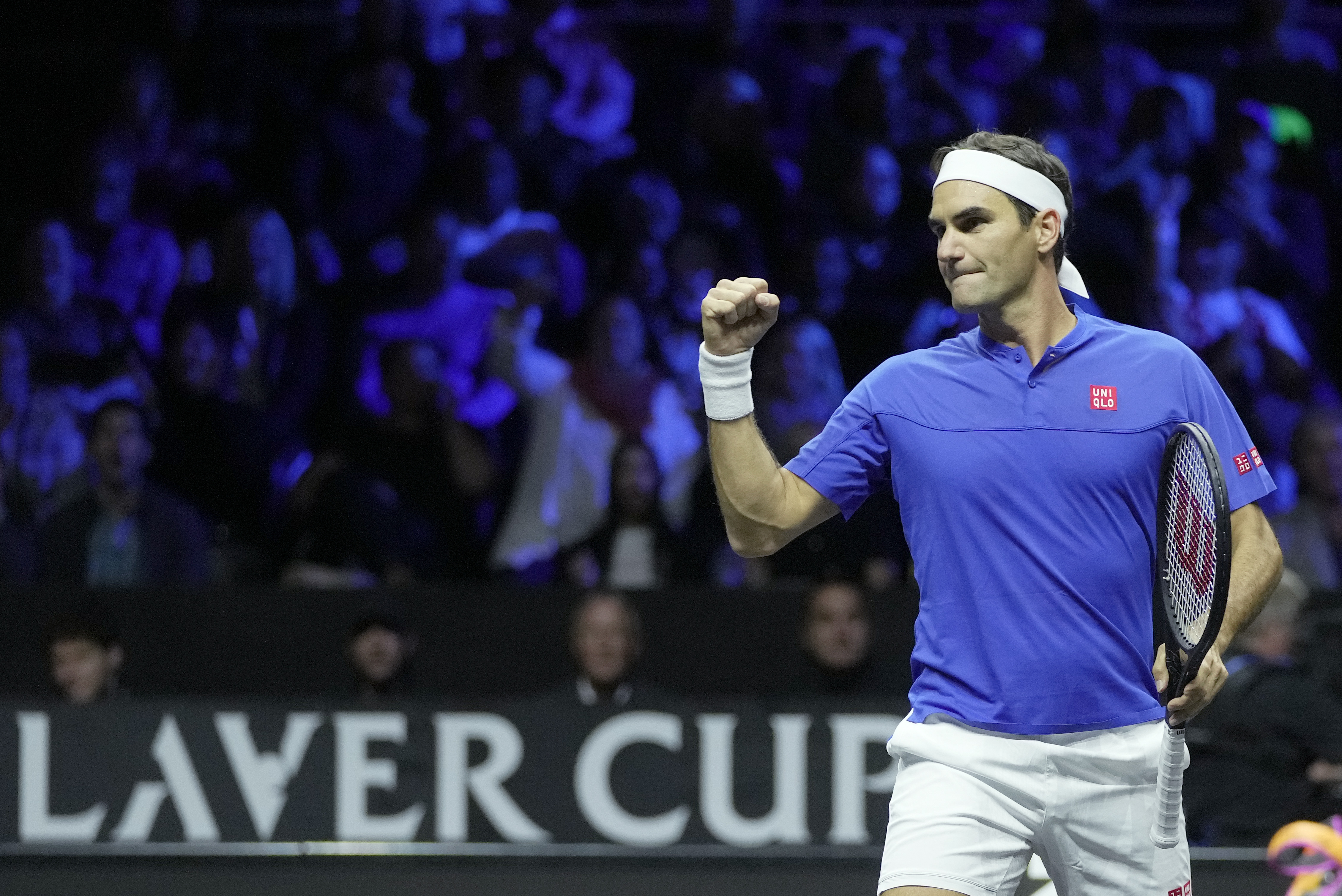 Team Europe's Roger Federer playing with Rafael Nadal reacts after winning a point during their Laver Cup doubles match against Team World's Jack Sock and Frances Tiafoe at the O2 arena in London, Friday, Sept. 23, 2022. (AP Photo/Kin Cheung)