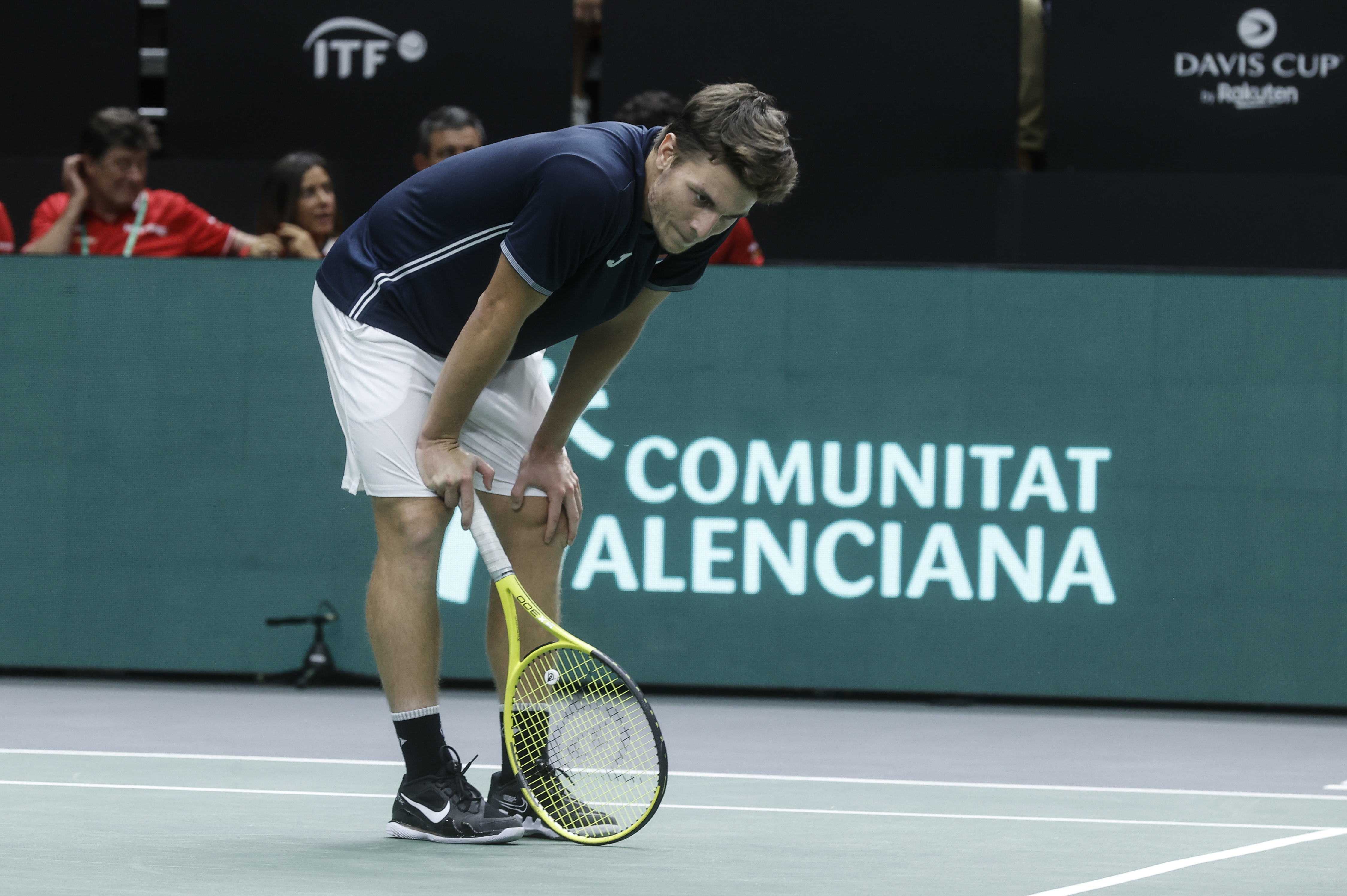 epa10184590 Serbian Miomir Kecmanovic in action against Spanish tennis player Roberto Bautista during their Davis Cup tennis match, in Valencia, eastern Spain, 14 September 2022.  EPA-EFE/Kai Forsterling