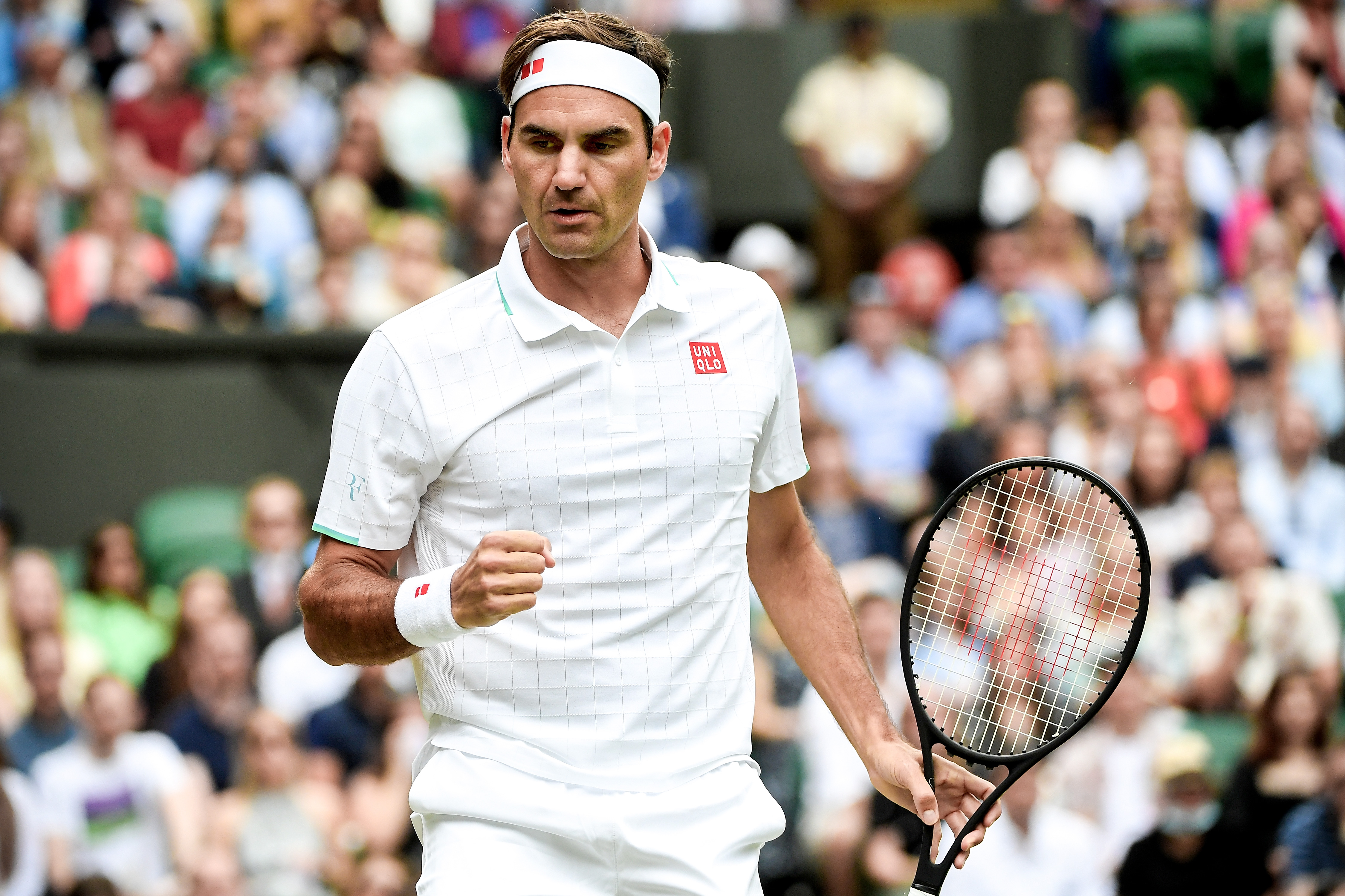 epa09320214 Roger Federer of Switzerland reacts during the 3rd round match against Cameron Norrie of Britain at the Wimbledon Championships, in Wimbledon, Britain, 03 July 2021.  EPA-EFE/FACUNDO ARRIZABALAGA   EDITORIAL USE ONLY