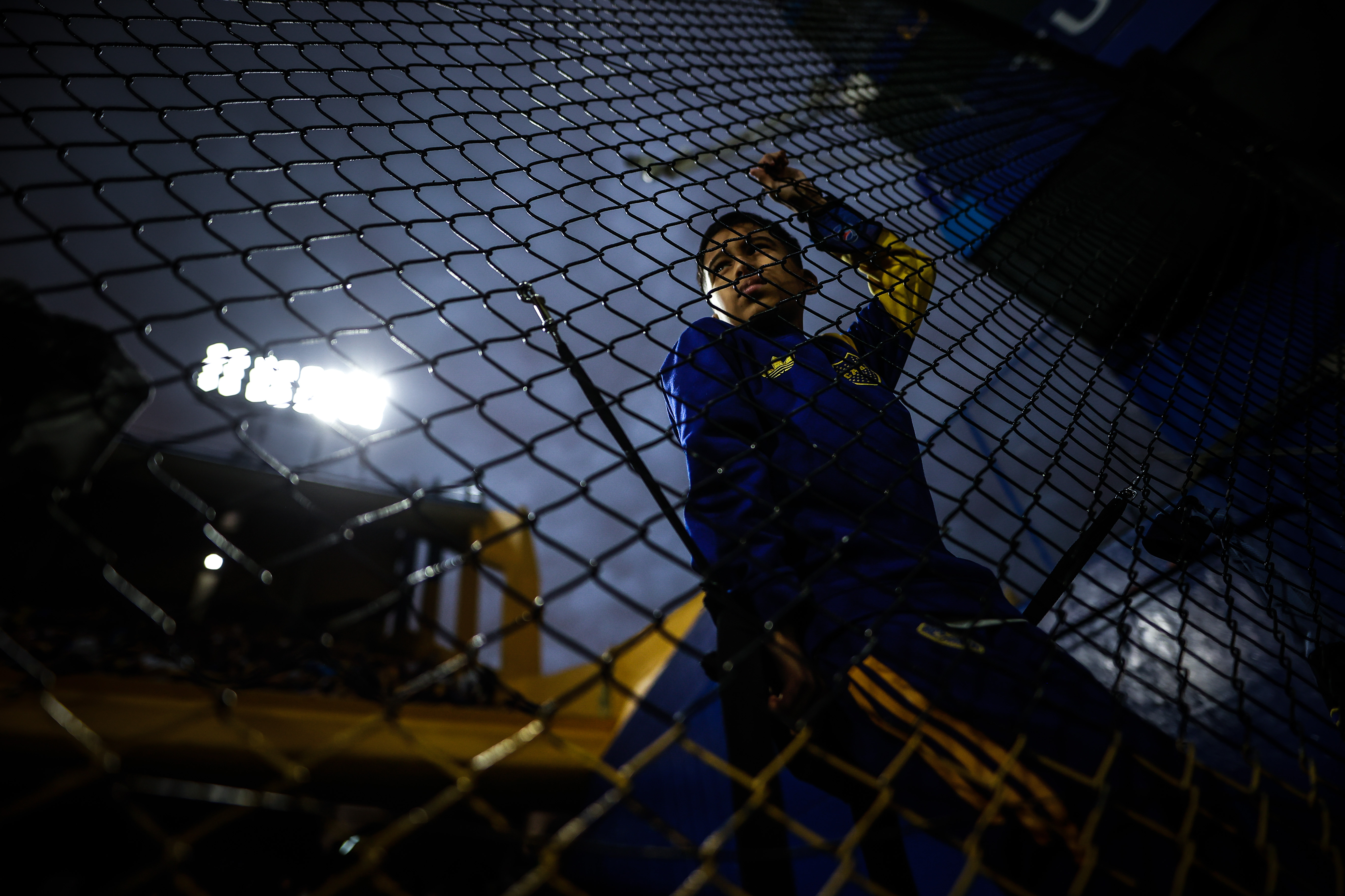 epa09887182 A Boca fan attends the Copa Libertadores soccer match between Boca Juniors and Always Ready, at La Bombonera stadium in Buenos Aires, Argentina, 12 April 2022.  EPA-EFE/Juan Ignacio Roncoroni