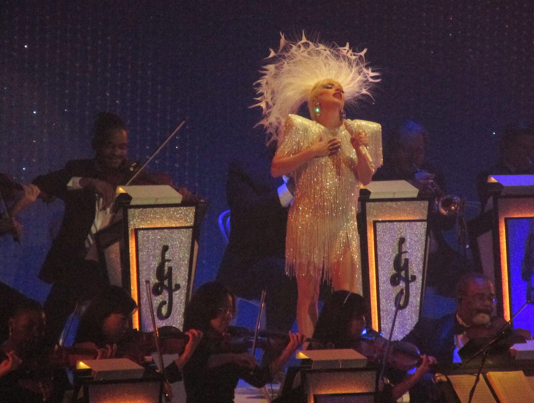 Lady Gaga dances and sings to the crowd at her 1st sold out piano and jazz show as fans and BTS watched her performance in Las Vegas