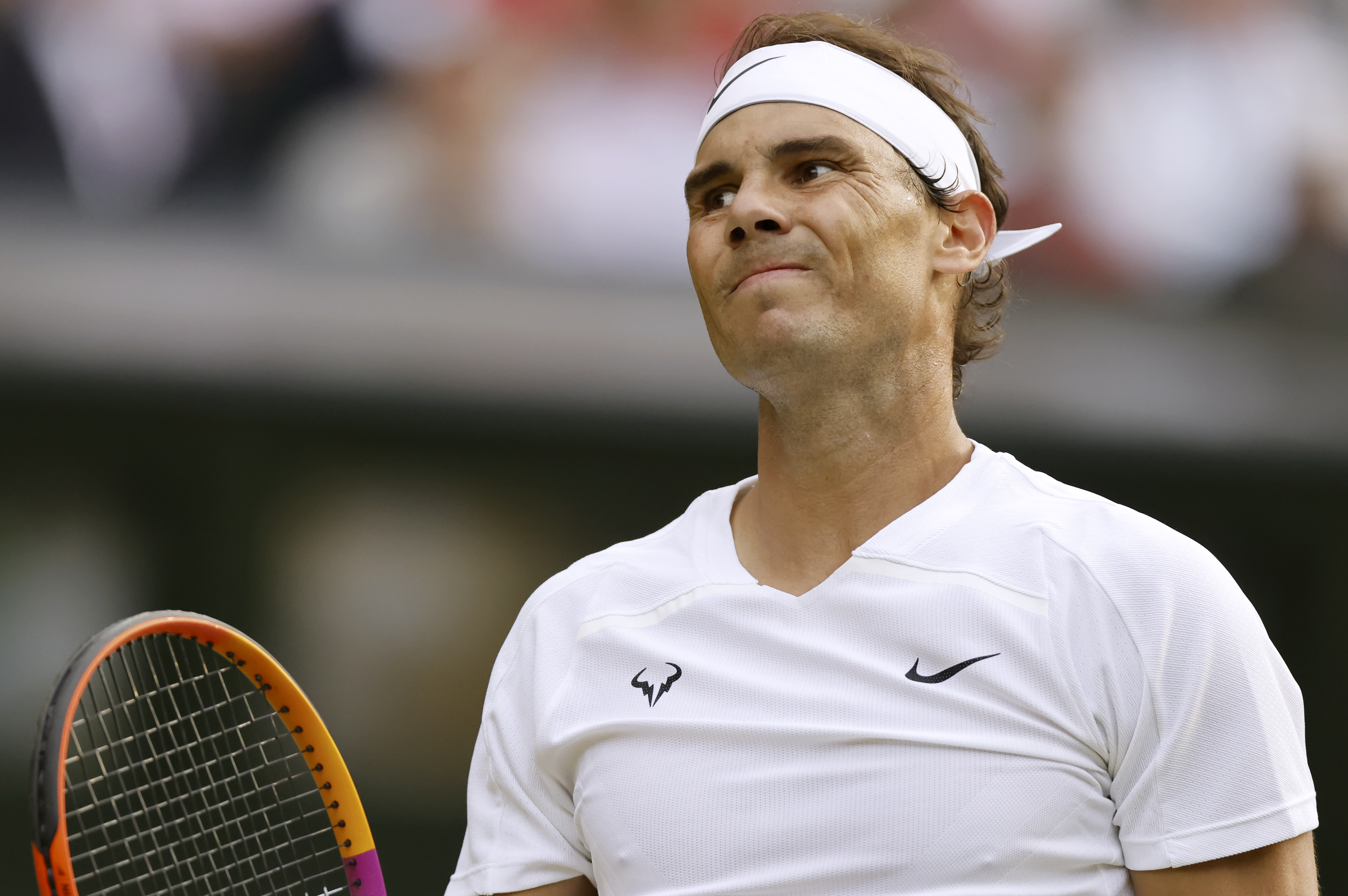 epa10052281 Rafael Nadal of Spain reacts during the 4th round match against Botic Van De Zandschulp of the Netherlands at the Wimbledon Championships, in Wimbledon, Britain, 04 July 2022.  EPA-EFE/TOLGA AKMEN   EDITORIAL USE ONLY