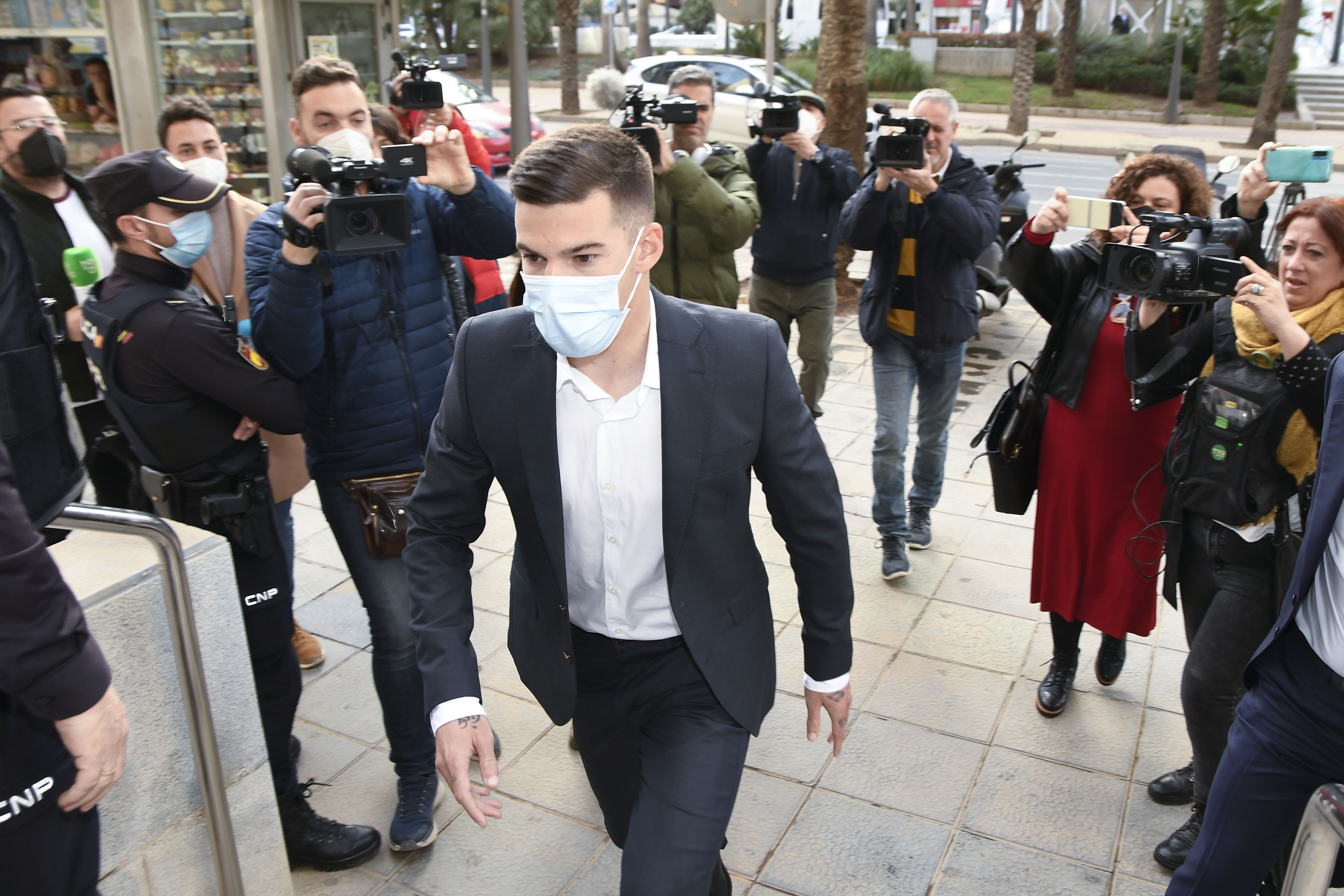 epa09855325 Soccer player Santi Mina arrives at court to attend the first session of his trial for alleged sexual assault of a woman in 2017, at Audiencia Provincial court in Almeria, southern Spain, 28 March 2022.  EPA-EFE/Carlos Barba