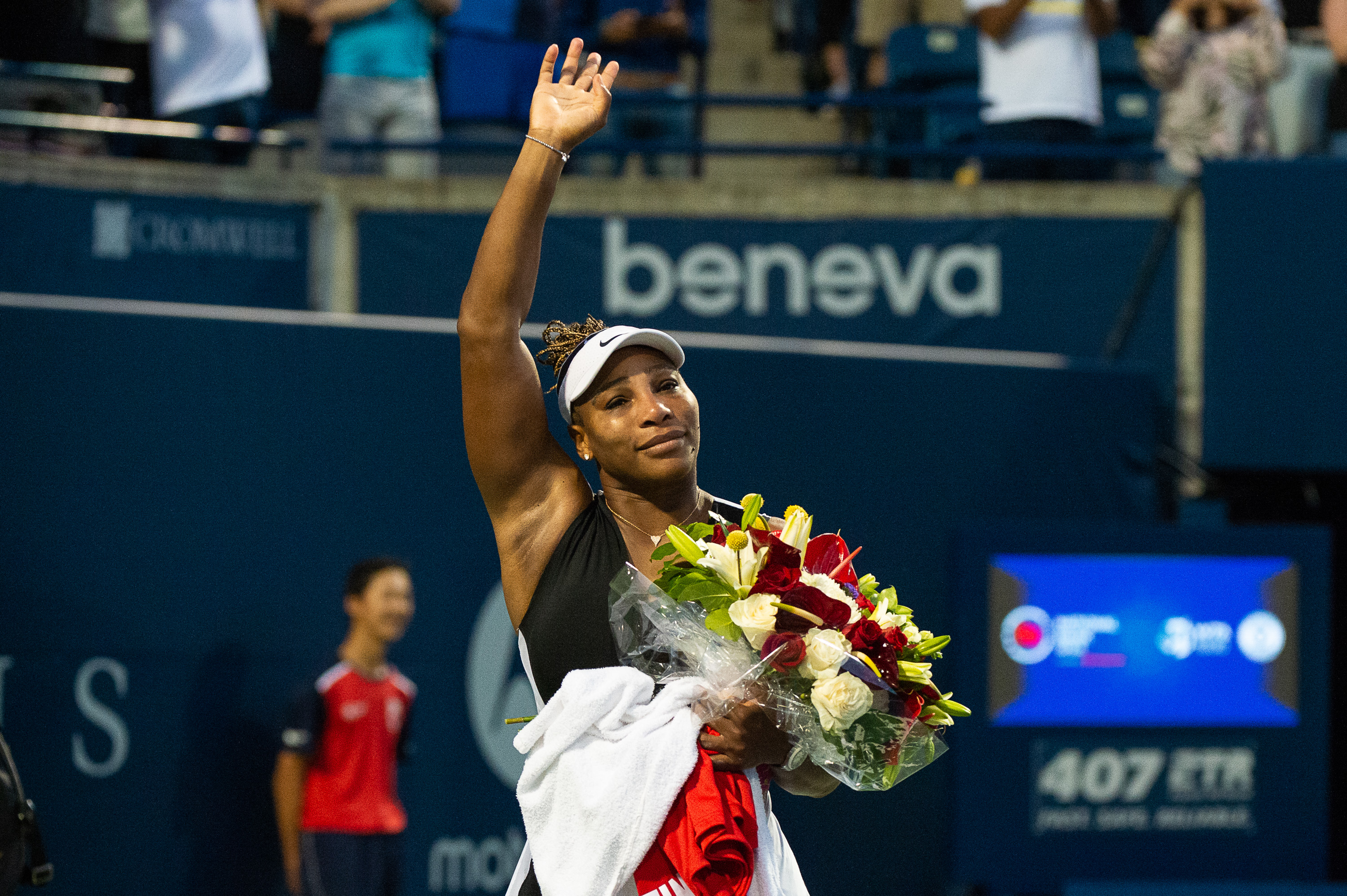 epa10115043 Serena Williams of the US acknowledges the crowd after her match against Belinda Bencic of Switzerland, during the second round of the National Bank Open women's tennis tournament, in Toronto, Canada, 10 August 2022.  EPA-EFE/EDUARDO LIMA
