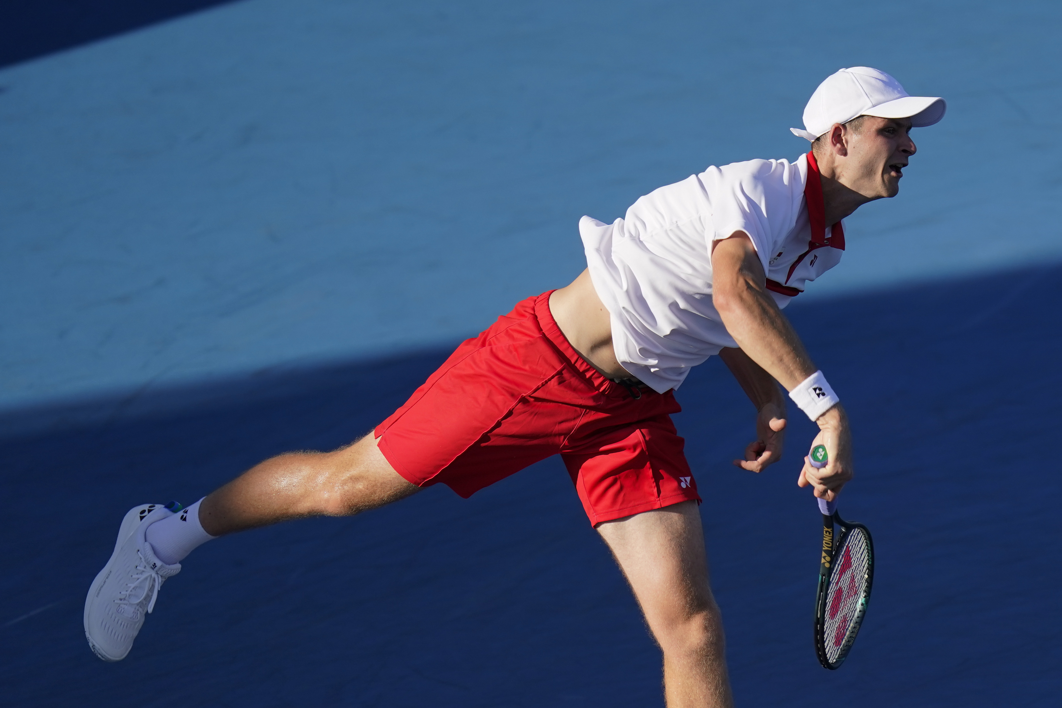 Hubert Hurkacz, of Poland, serves to Liam Broady, of Britain, during the second round of the men's tennis competition at the 2020 Summer Olympics, Tuesday, July 27, 2021, in Tokyo, Japan. (AP Photo/Patrick Semansky)