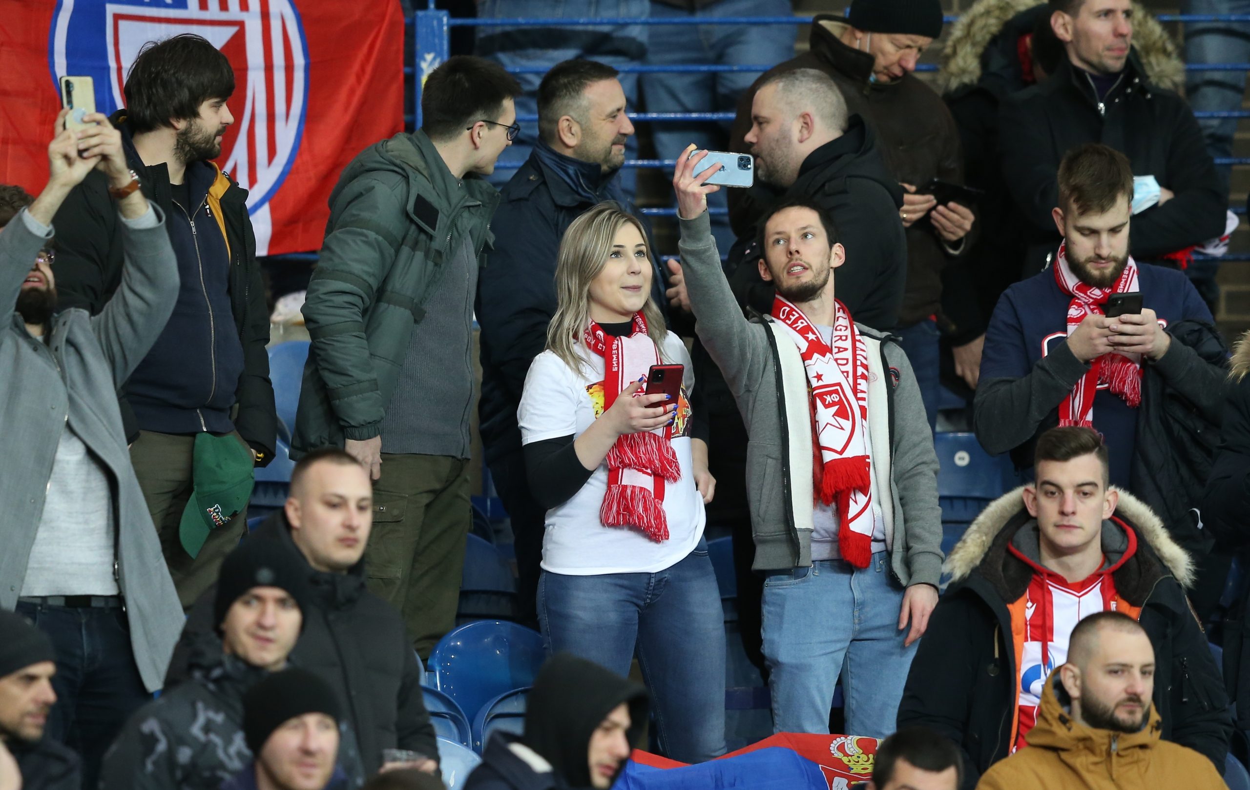 epa09815641 Red Star supporters arrive for the UEFA Europa League round of 16, first leg soccer match between Glasgow Rangers and Red Star Belgrade in Glasgow, Britain, 10 March 2022.  EPA-EFE/ROBERT PERRY