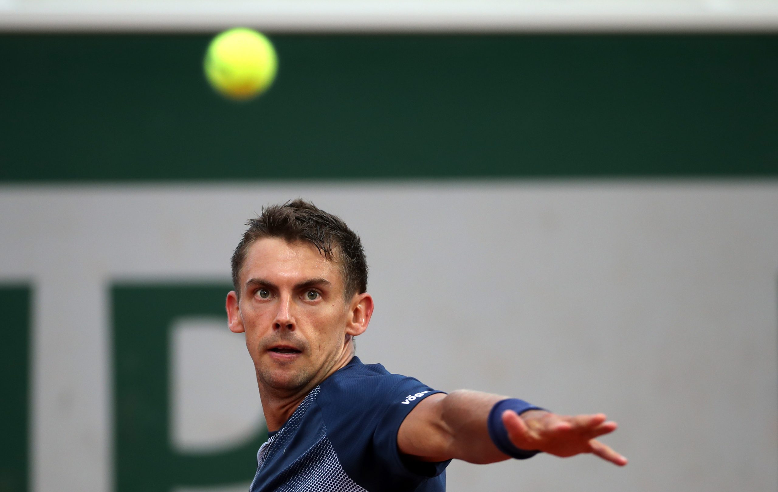 epa09970225 Henri Laaksonen of Switzerland plays Pedro Martinez of Spain in their men?s first round match during the French Open tennis tournament at Roland ?Garros in Paris, France, 23 May 2022.  EPA-EFE/MARTIN DIVISEK