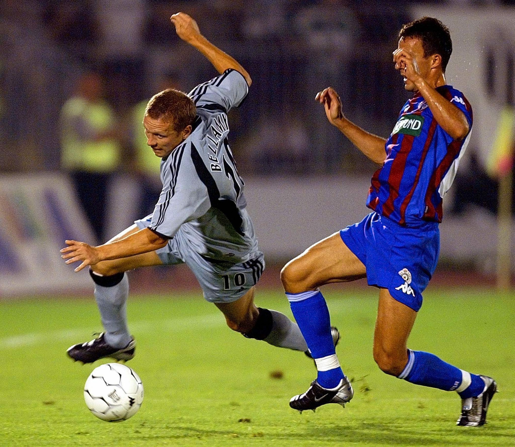 Nenad Djordjevic (R) of Partizan Belgrade fights for the ball with Bellamy Craig (L) of Newcastle during their UEFA Champions League, third qualirying round match, in Belgrade, Wednesday 13 August 2003.
EPA PHOTO/EPA/SRDJAN SUKI