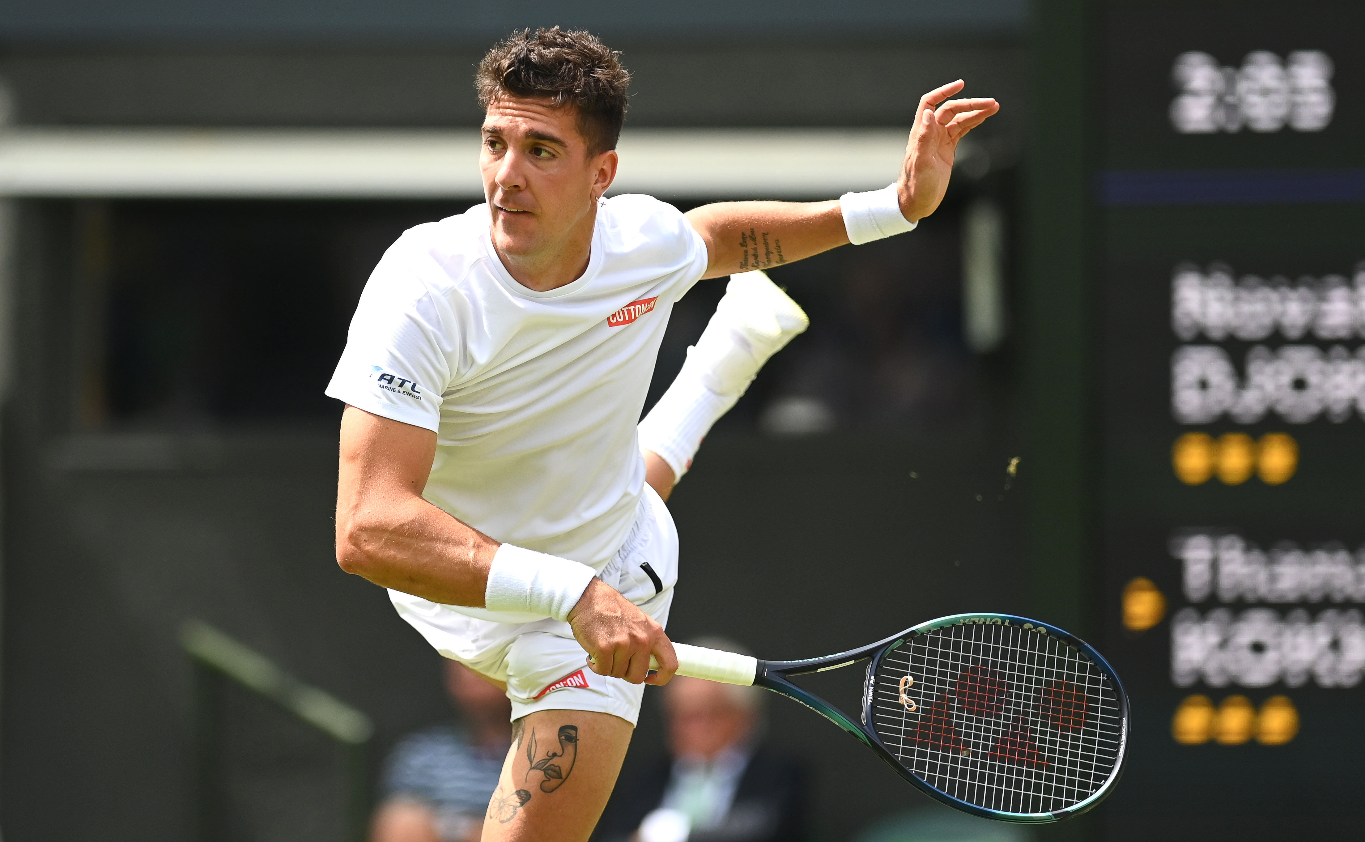 epa10041314 Thanasi Kokkinakis of Australia in action during the men's second round match against Novak Djokovic of Serbia at the Wimbledon Championships in Wimbledon, Britain, 29 June 2022.  EPA-EFE/NEIL HALL   EDITORIAL USE ONLY
