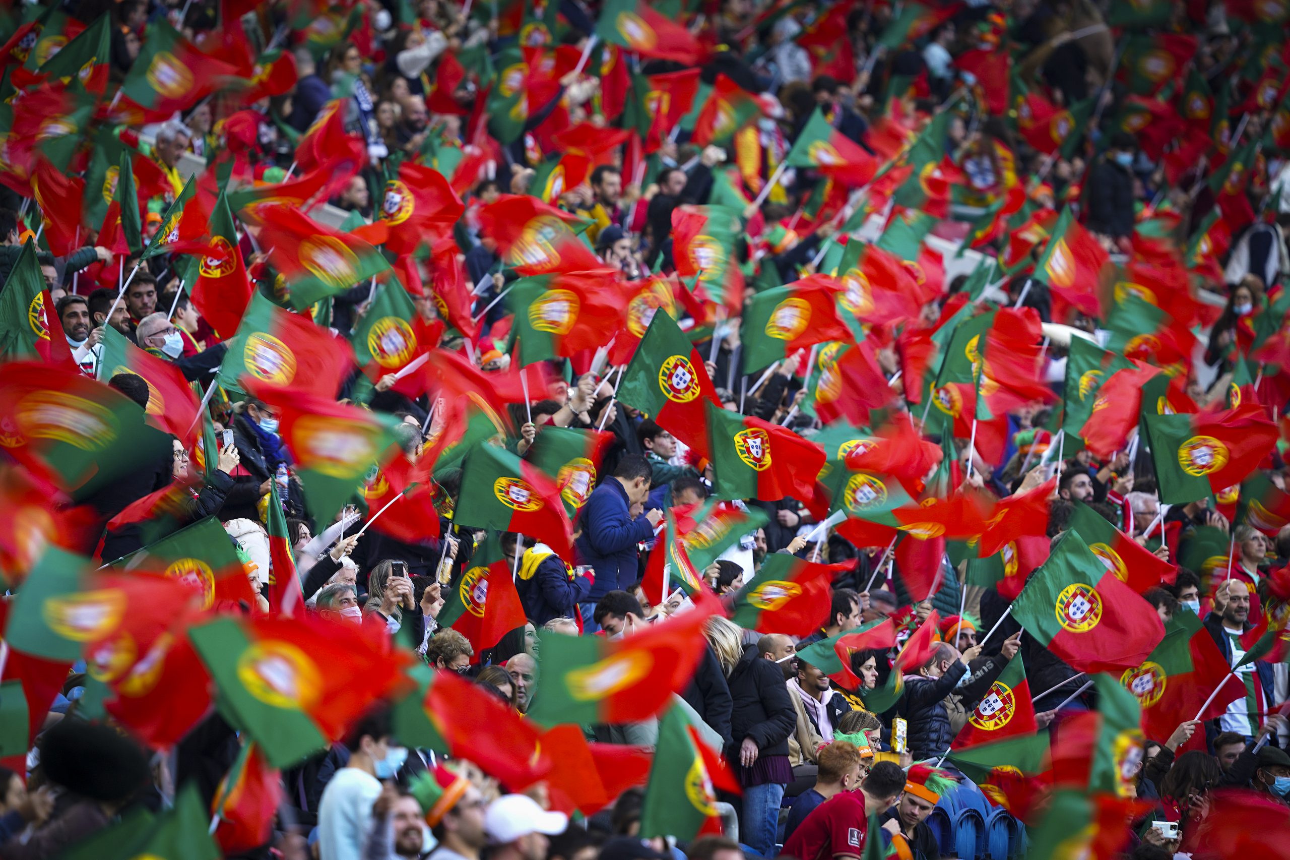 epa09858719 Portuguese fans cheer for their team during the FIFA World Cup Qatar 2022 play-off qualifying soccer match Portugal vs North Macedonia held on Dragao stadium in Porto, Portugal, 29 March 2022.  EPA-EFE/HUGO DELGADO